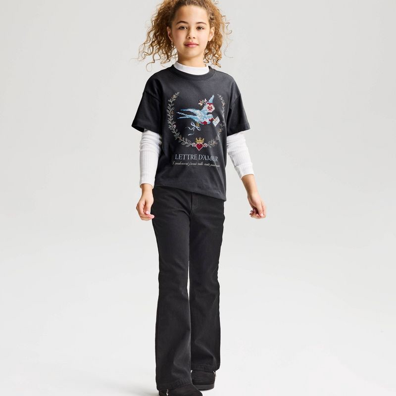 slide 1 of 3, Girls' Short Sleeve 100% Cotton Bird Oversized Graphic T-Shirt - Cat & Jack™ Black S, 1 ct