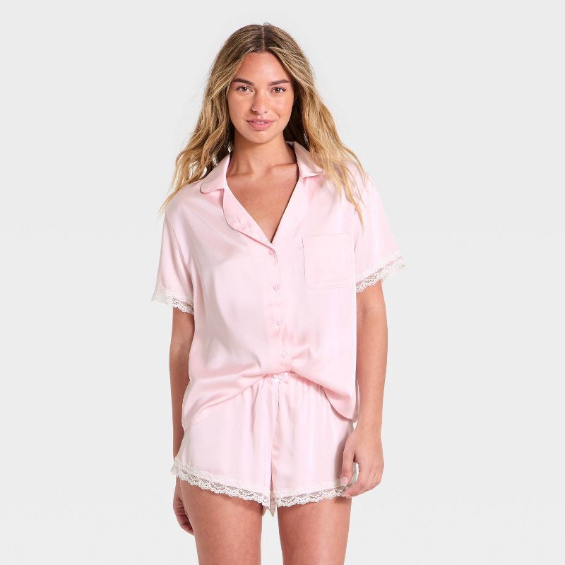 slide 1 of 3, Women's Lace Trim Satin Short Sleeve Notch Collar Shirt and Shorts Pajama Set - Wild Fable™ Pink XS, 1 ct