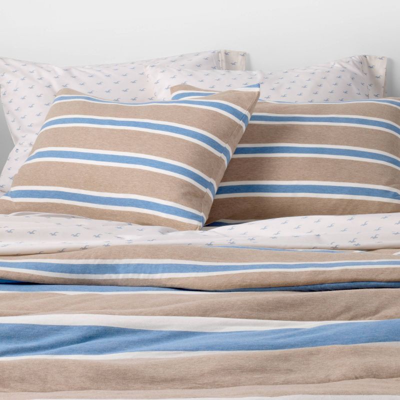 slide 1 of 5, Twin/Twin Extra Long Reversible Jersey Puff Comforter Set Blue/Brown Stripe - The Hollister Collection at Target, 1 ct