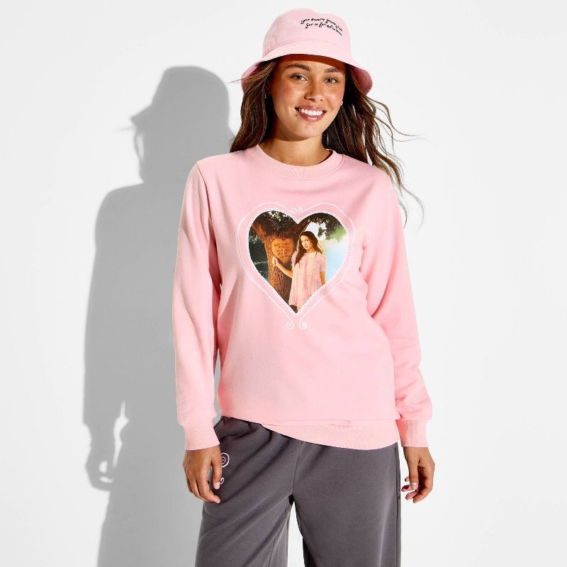 slide 1 of 6, Women's Crewneck Olivia Rodrigo Graphic Pullover Sweatshirt - Pink XL, 1 ct