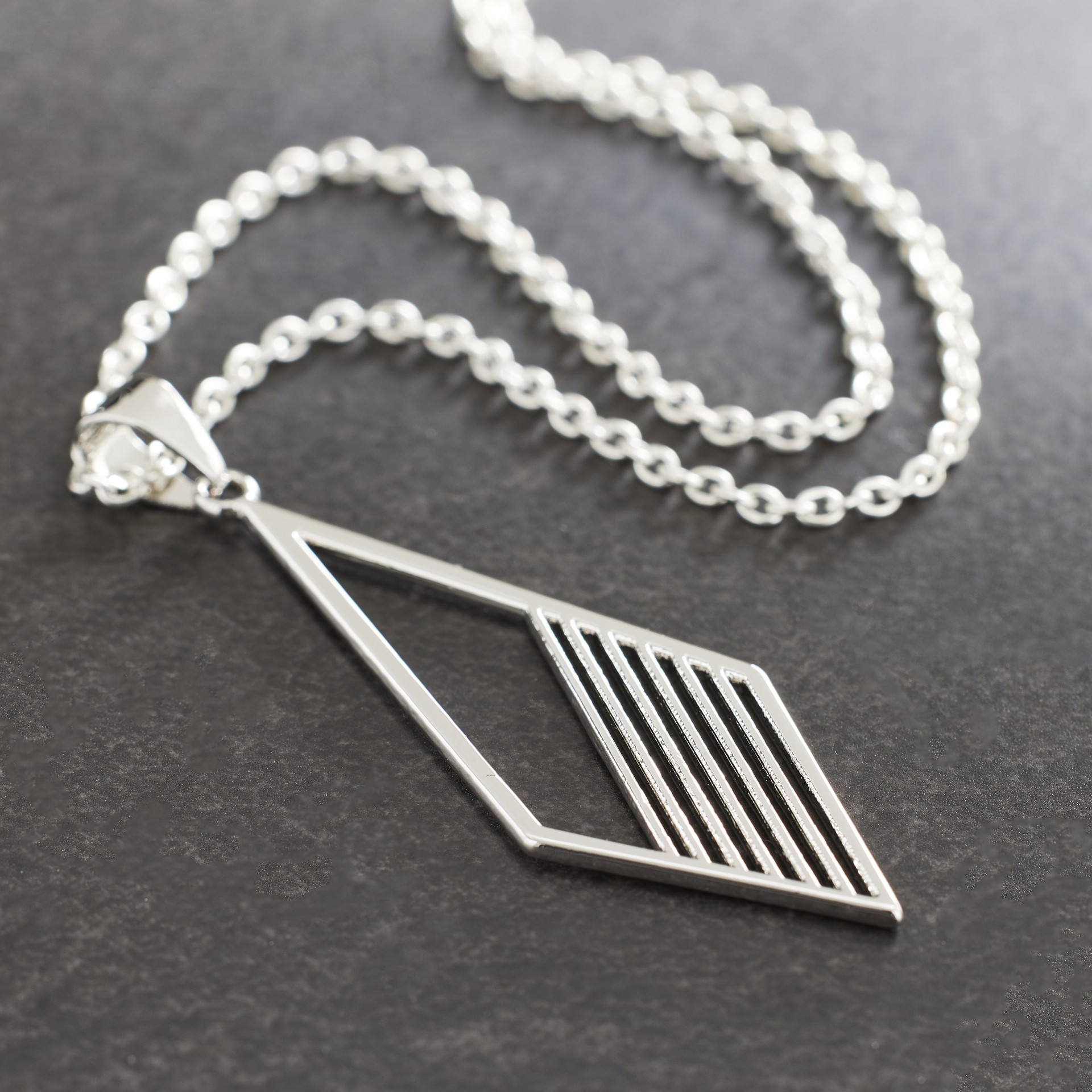 slide 2 of 3, Rhodium Rhombus With Lines Pendant By Bead Landing, 18mm x 49mm