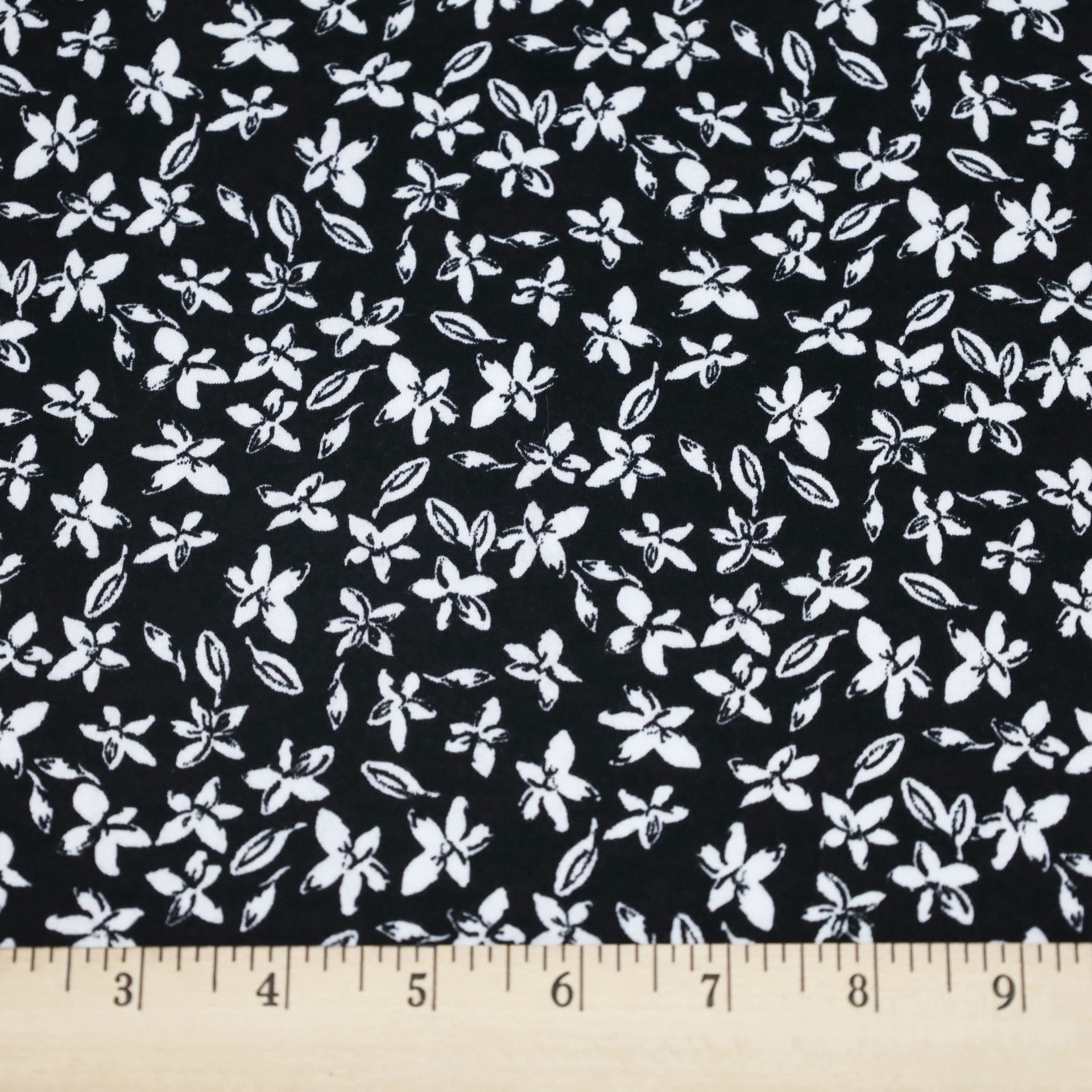 slide 3 of 3, Fabric Merchants Leaves On Black Double Brushed Stretch Fabric, 60 in