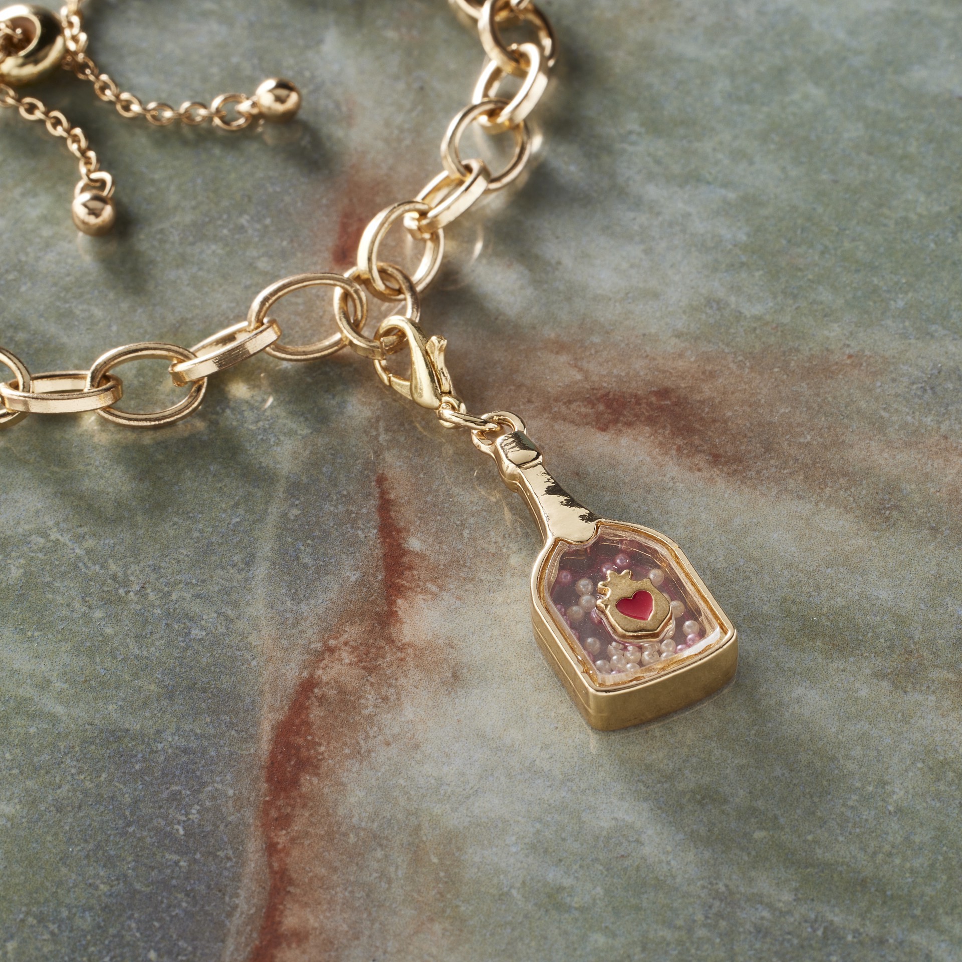 slide 2 of 3, Champagne Bottle Shaker Charm By Bead Landing, 31 mm charm diameter