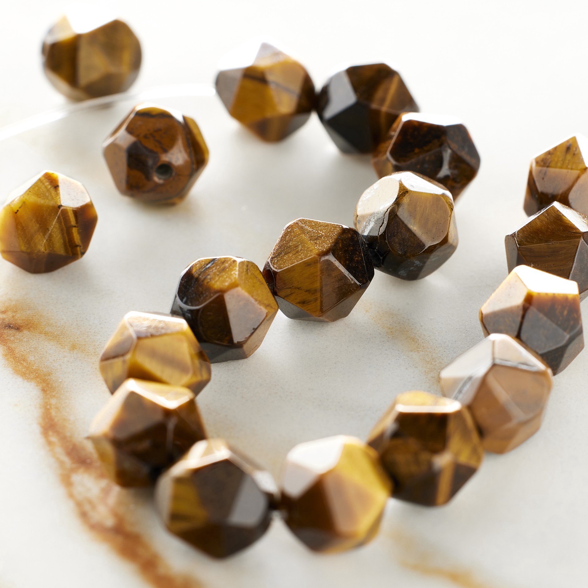 slide 3 of 3, Tiger Eye Faceted Beads By Bead Landing, 8 mm