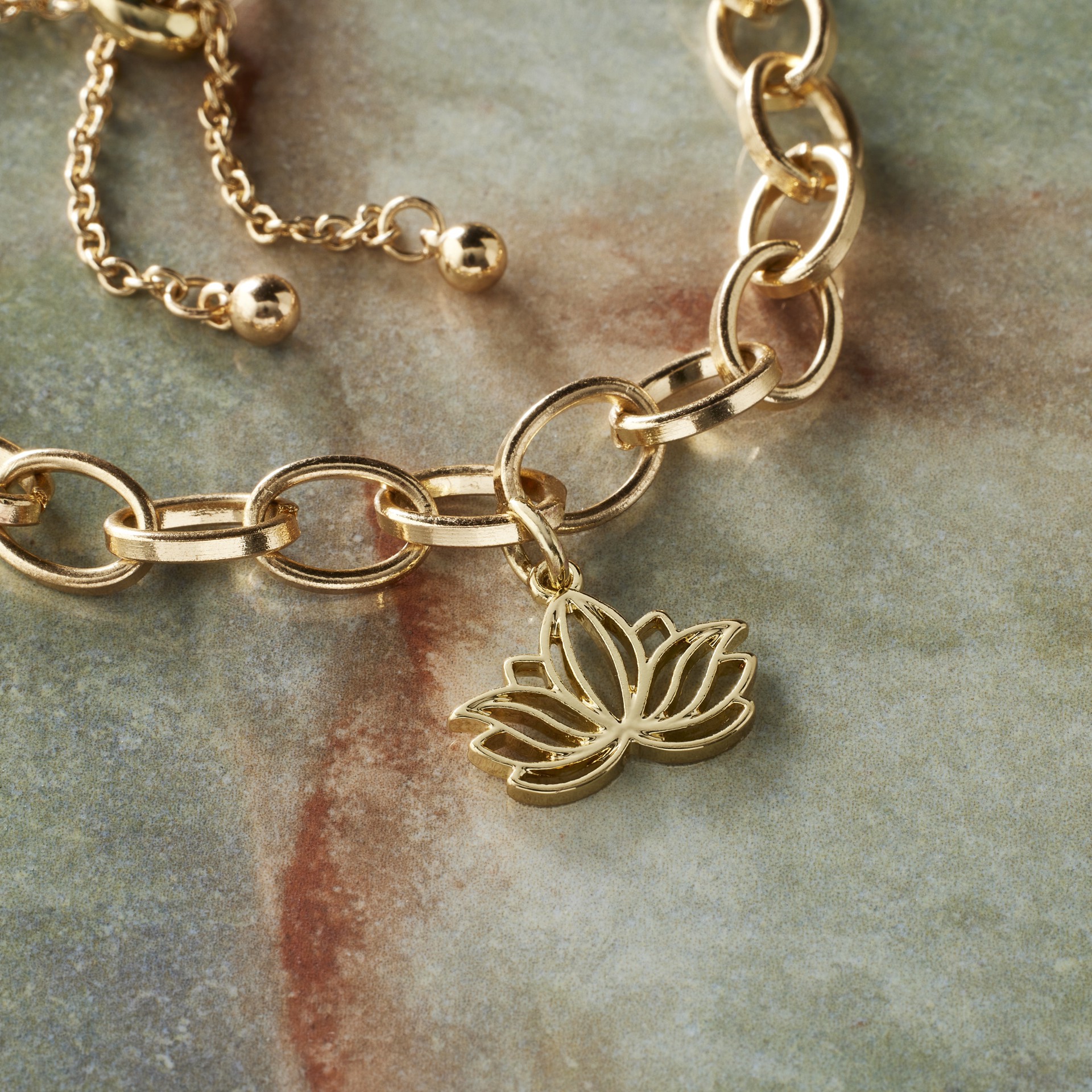 slide 4 of 6, 14k Gold Plated Lotus Charm By Bead Landing, 0.87 in x 0.68 in x 0.06 in