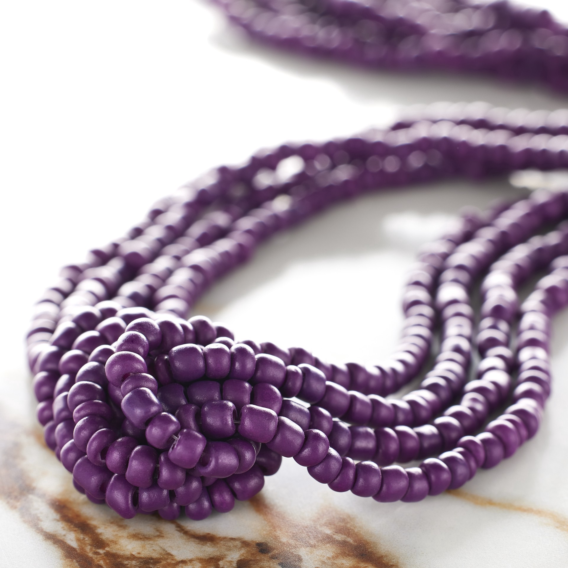 slide 2 of 3, Purple Glass Medium Rondelle Seed Beads, 6/0 By Bead Landing, 6/0