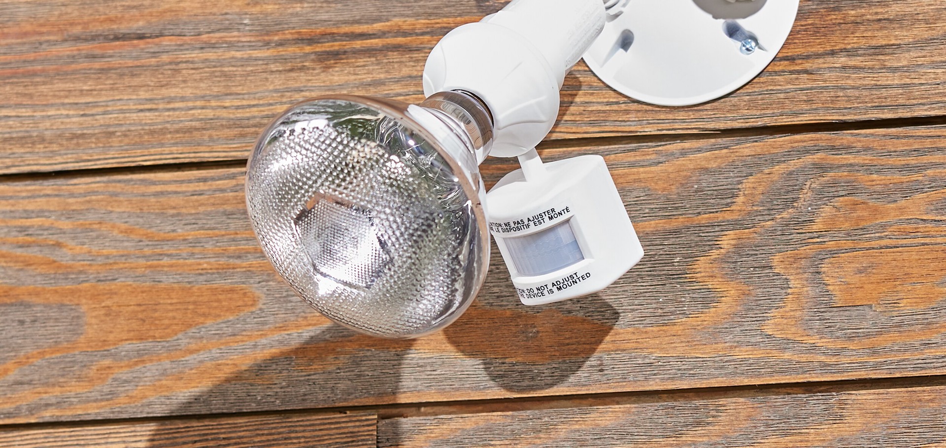 slide 3 of 6, Utilitech 180 -Degree 150 -Wattage Equivalent Electrical outlet Halogen white 1 -Head Motion-Activated Flood Light with Timer, 1 ct