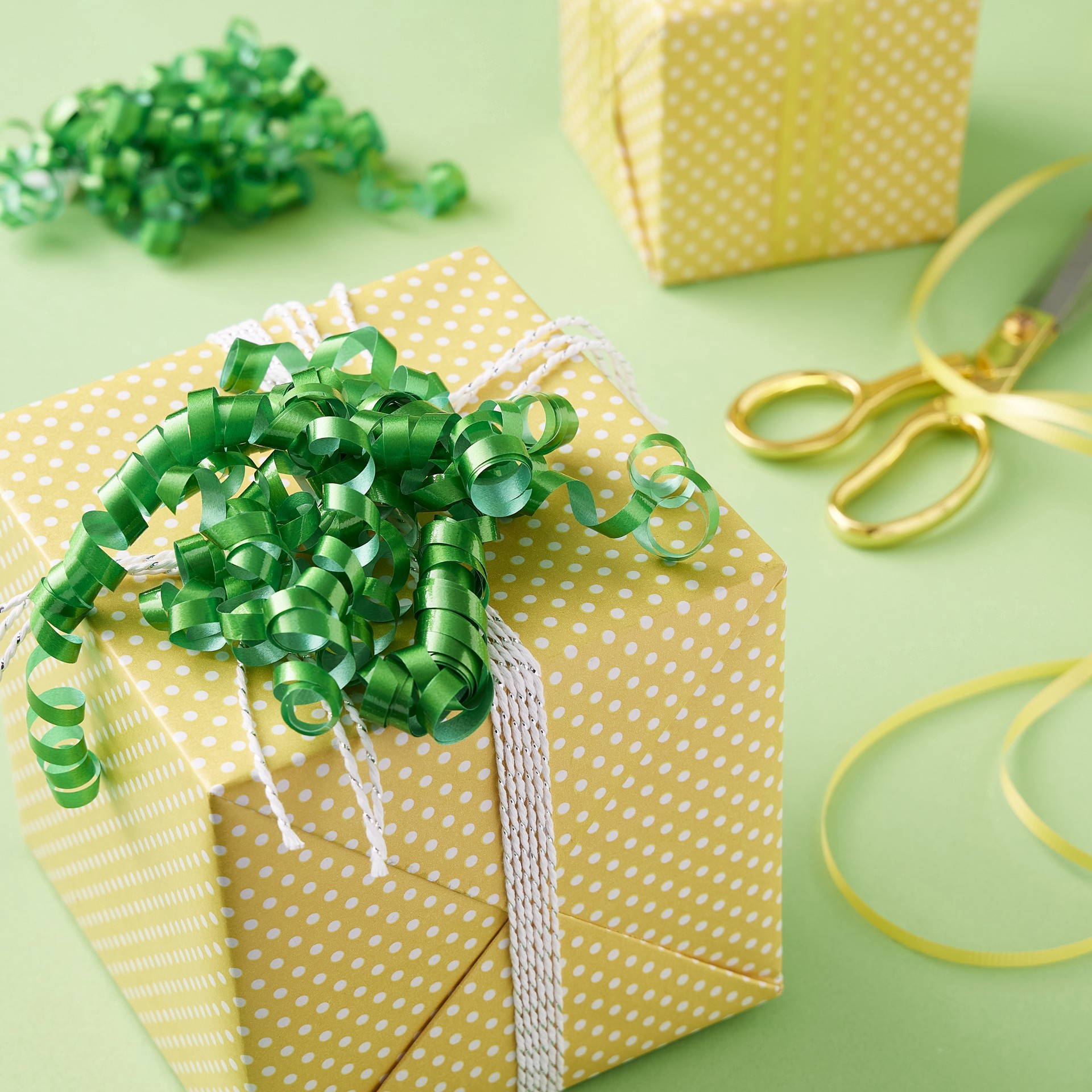 slide 3 of 3, Kelly Green Twisty Bows By Celebrate It, 0.25 in x 30 in