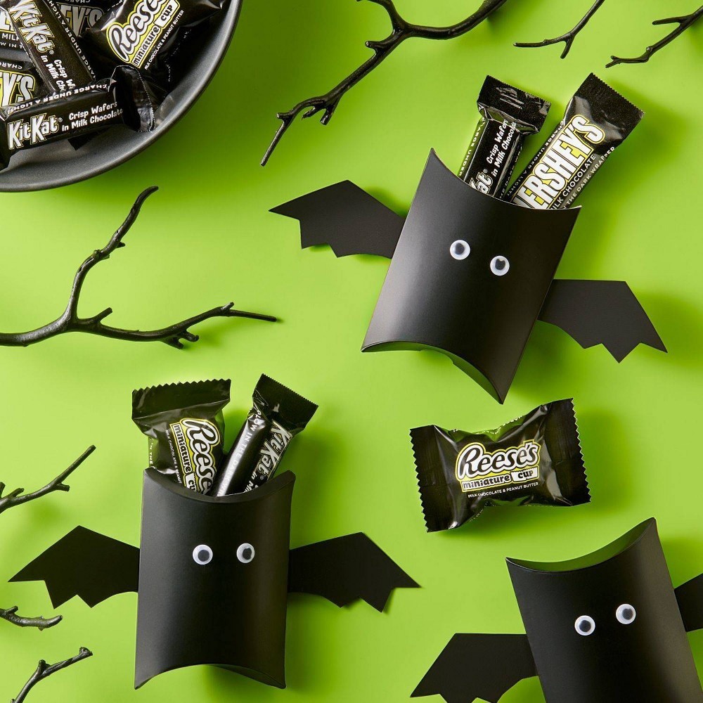 slide 2 of 6, Hershey's Halloween Candy Assortment with Glow in the Dark Wrappers, 45.6 oz