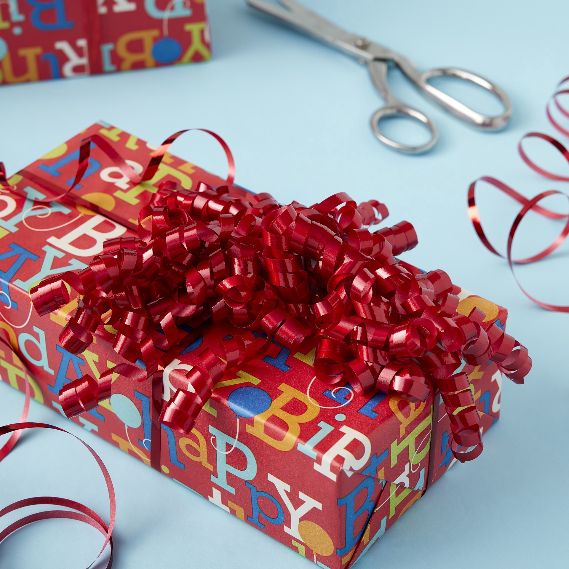 slide 3 of 3, Red Twisty Bows By Celebrate It, 0.25 in x 30 in