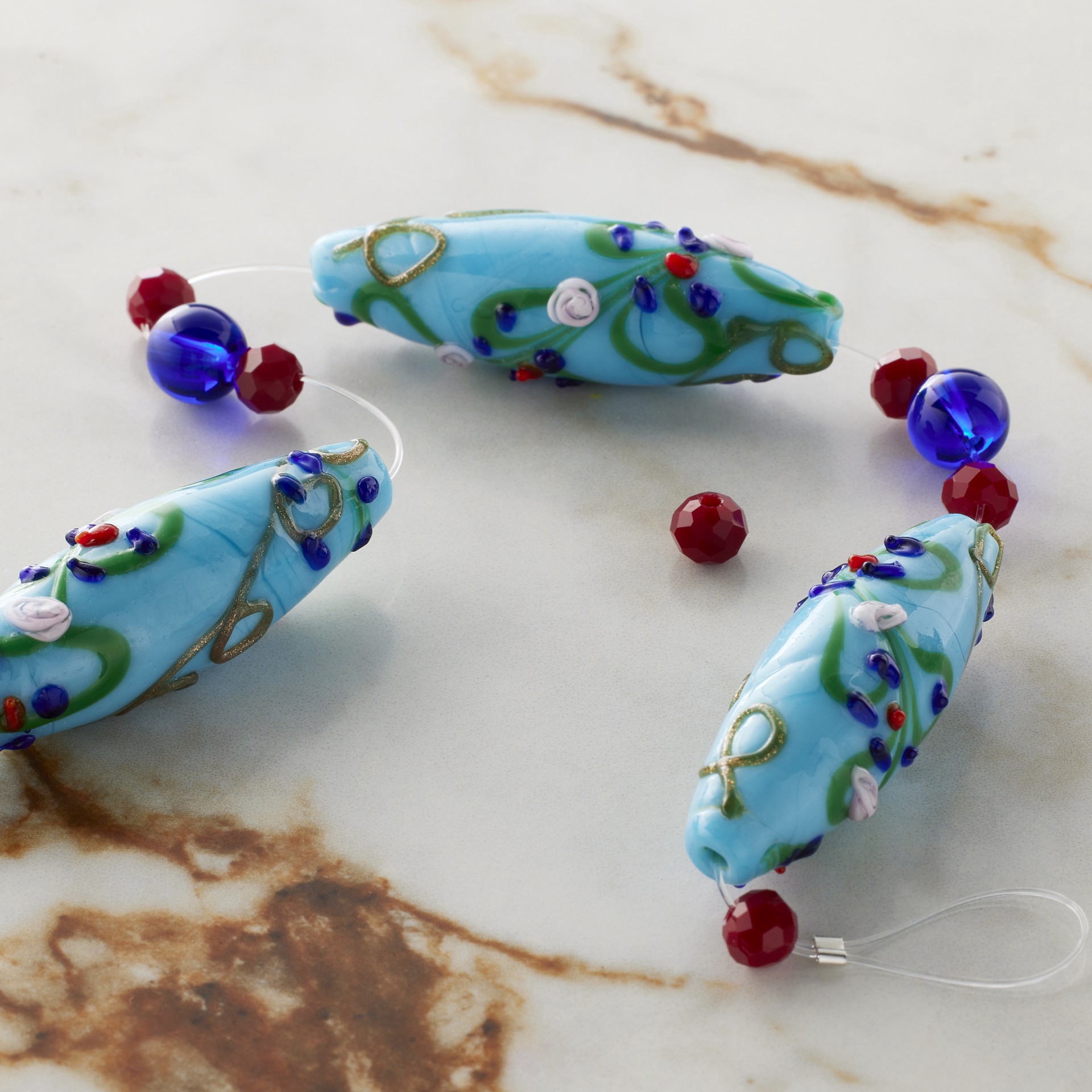 slide 2 of 3, Blue Lampwork Glass Oval Bead Mix By Bead Landing, 41mm x 13mm