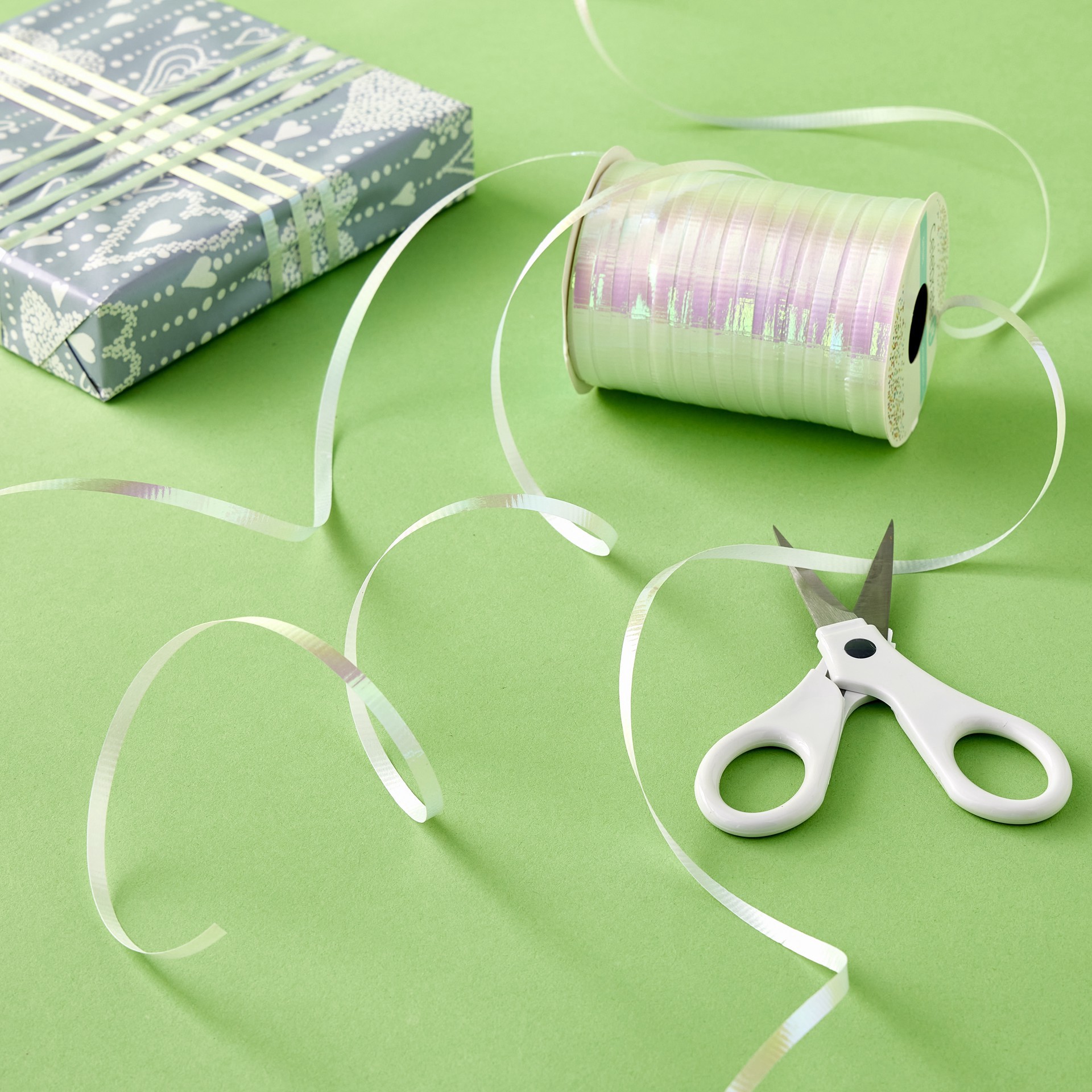 slide 4 of 4, 3/16" Iridescent White Curling Ribbon By Celebrate It, 3/16 in