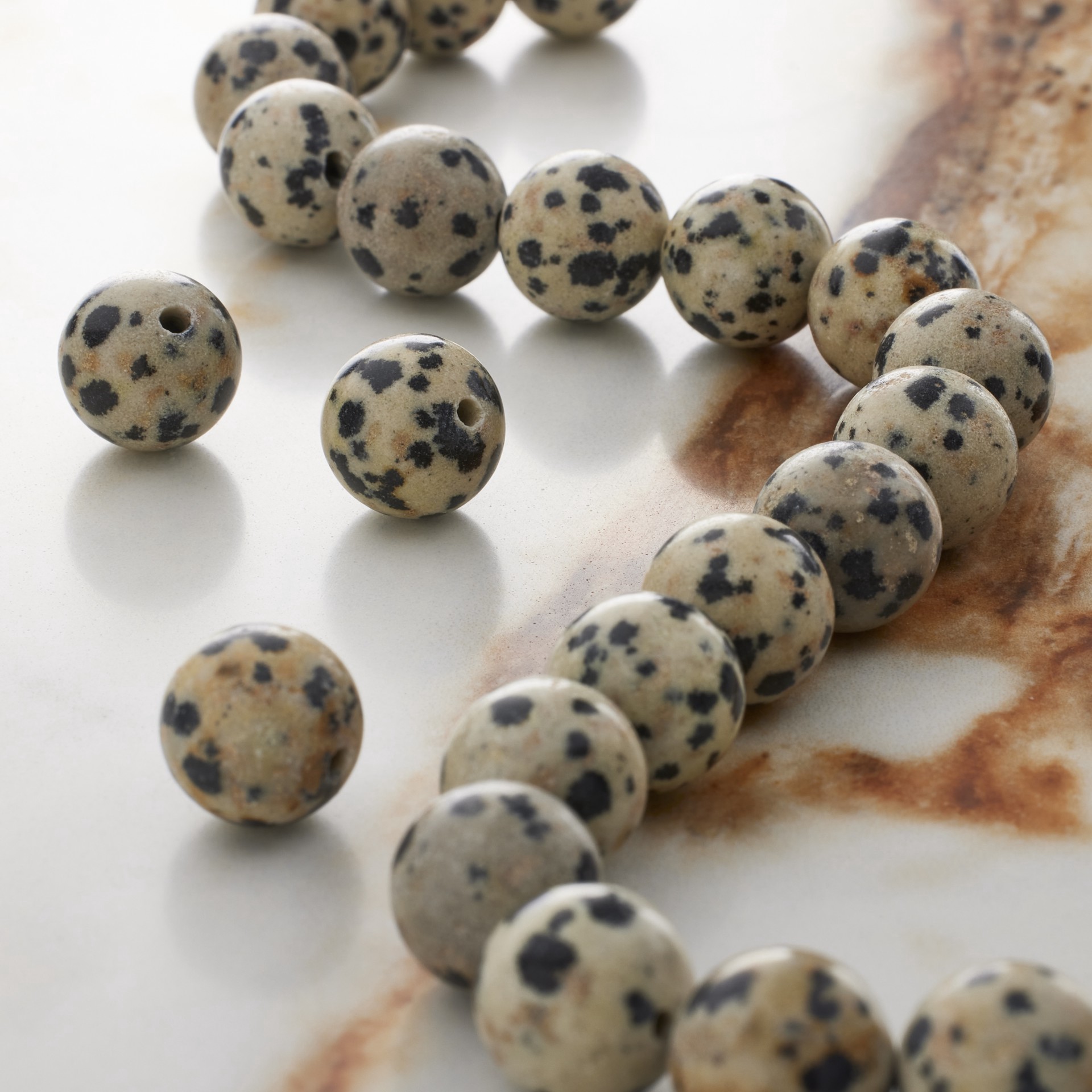 slide 2 of 3, Black & White Dalmatian Jasper Round Beads By Bead Landing, 10 mm
