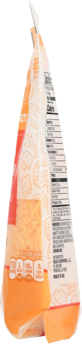slide 6 of 13, Rouses Markets Sharp Cheddar Finely Shredded Cheese 8 oz, 8 oz