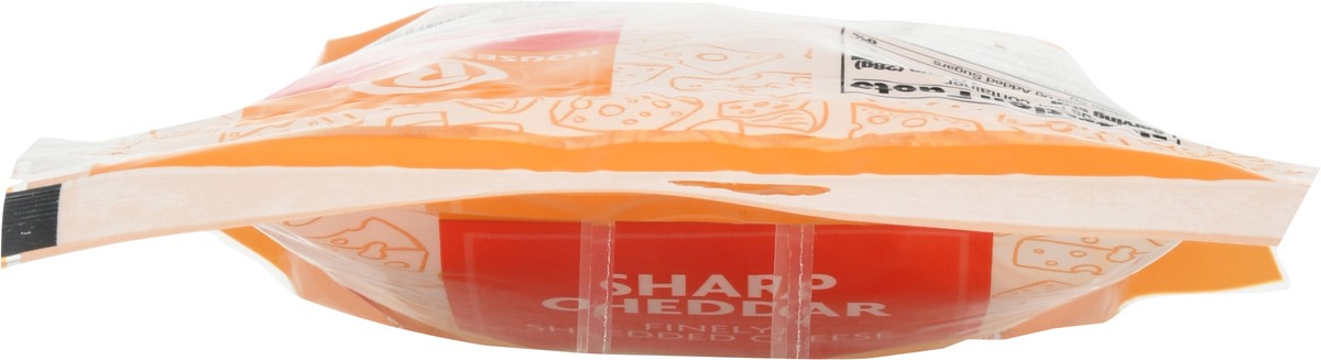 slide 10 of 13, Rouses Markets Sharp Cheddar Finely Shredded Cheese 8 oz, 8 oz