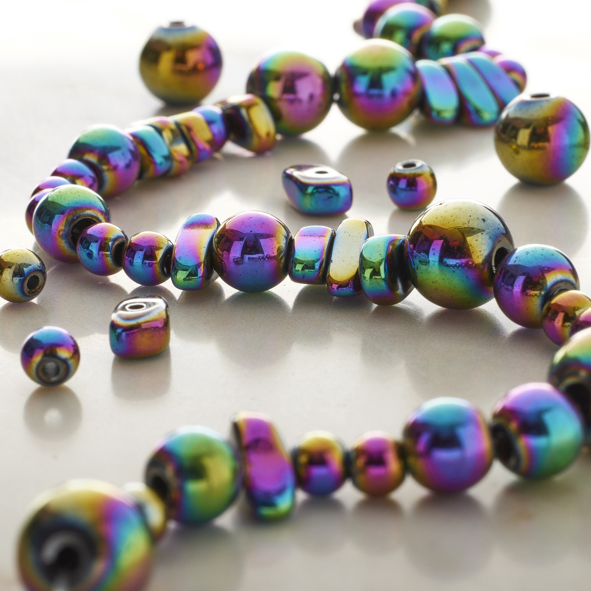 slide 3 of 3, Mixed Rainbow Reconstituted Hematite Beads By Bead Landing, 4mm-10mm