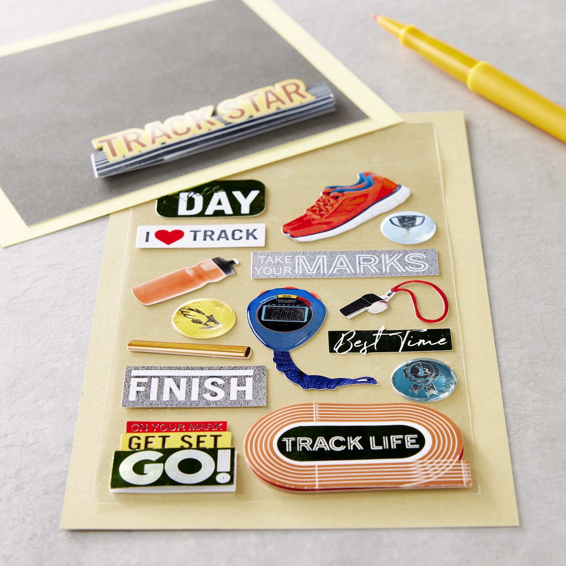 slide 3 of 5, Track Star Dimensional Stickers By Recollections, 3.875 in x 6.875 in