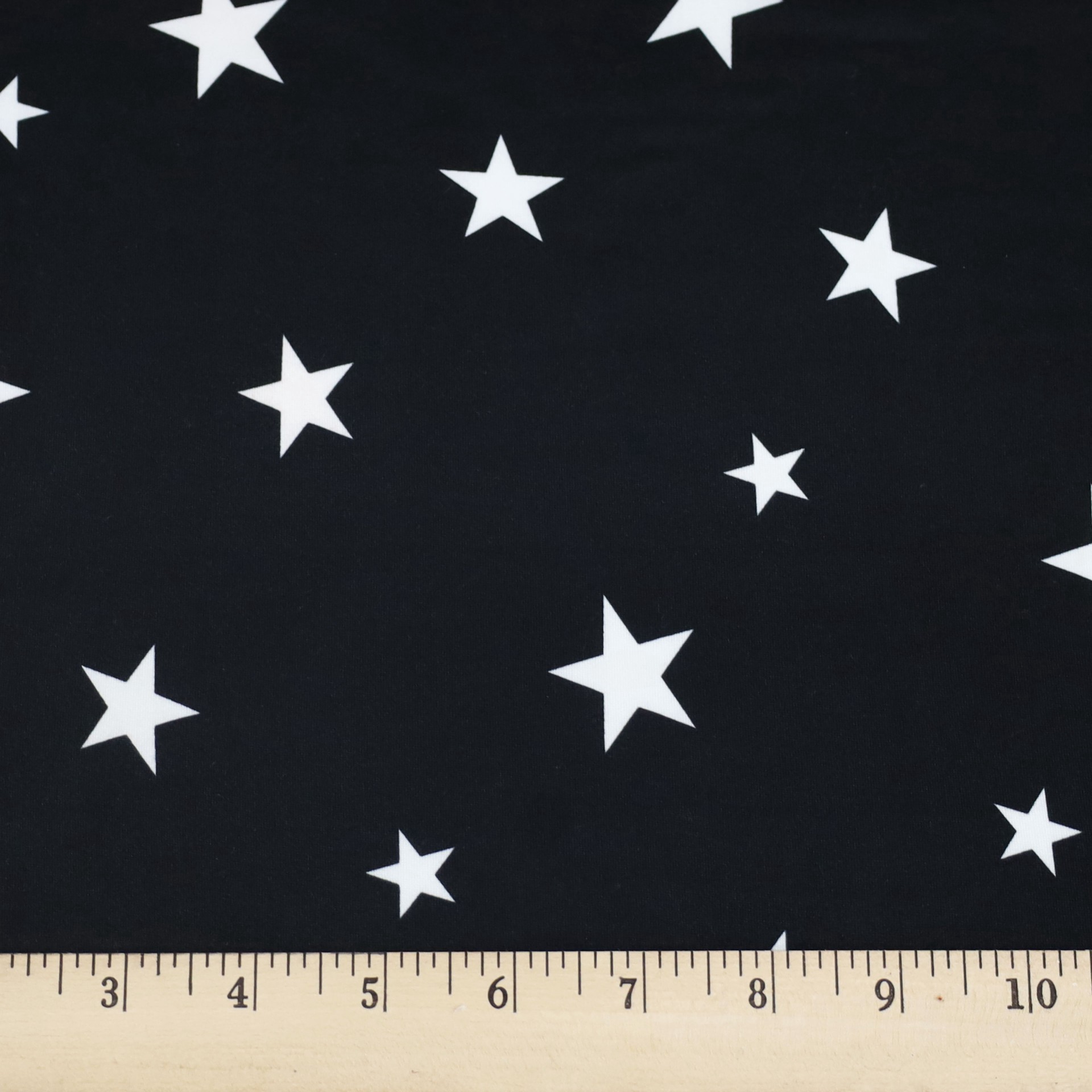 slide 3 of 3, Fabric Merchants Stars On Black Double Brushed Stretch Fabric, 60 in