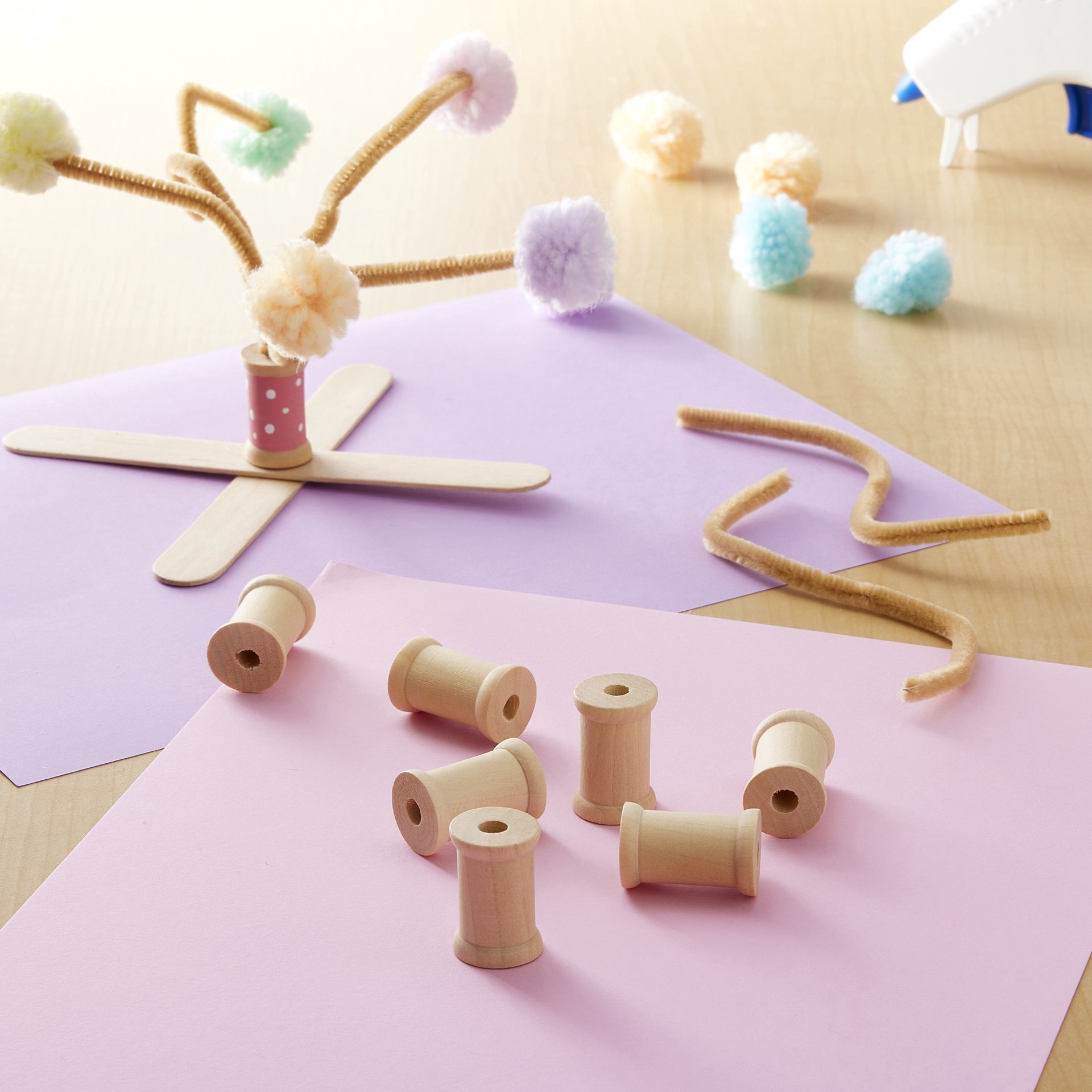 slide 2 of 3, 1" Wooden Spools By Creatology, 0.68 in x 1.10 in