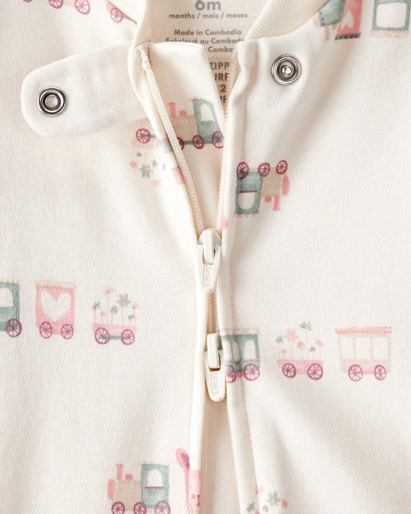 slide 2 of 3, Carter's Baby Girl Train Print 100% Cotton Long-Sleeve Snug Fit Sleep & Play Pajamas - Cream Cream 3M, 1 ct