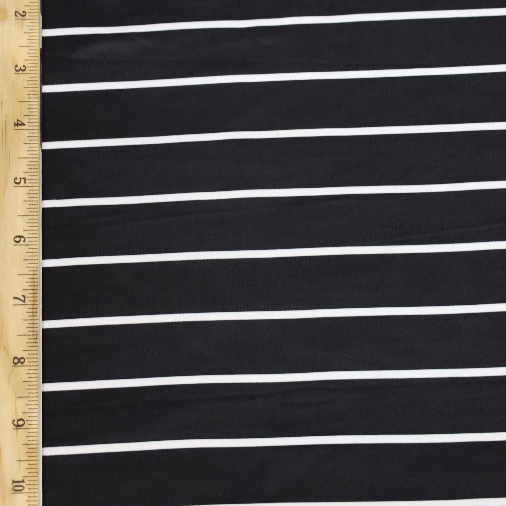 slide 2 of 3, Fabric Merchants White Stripes On Black Double Brushed 4-Way Stretch Fabric, 60 in