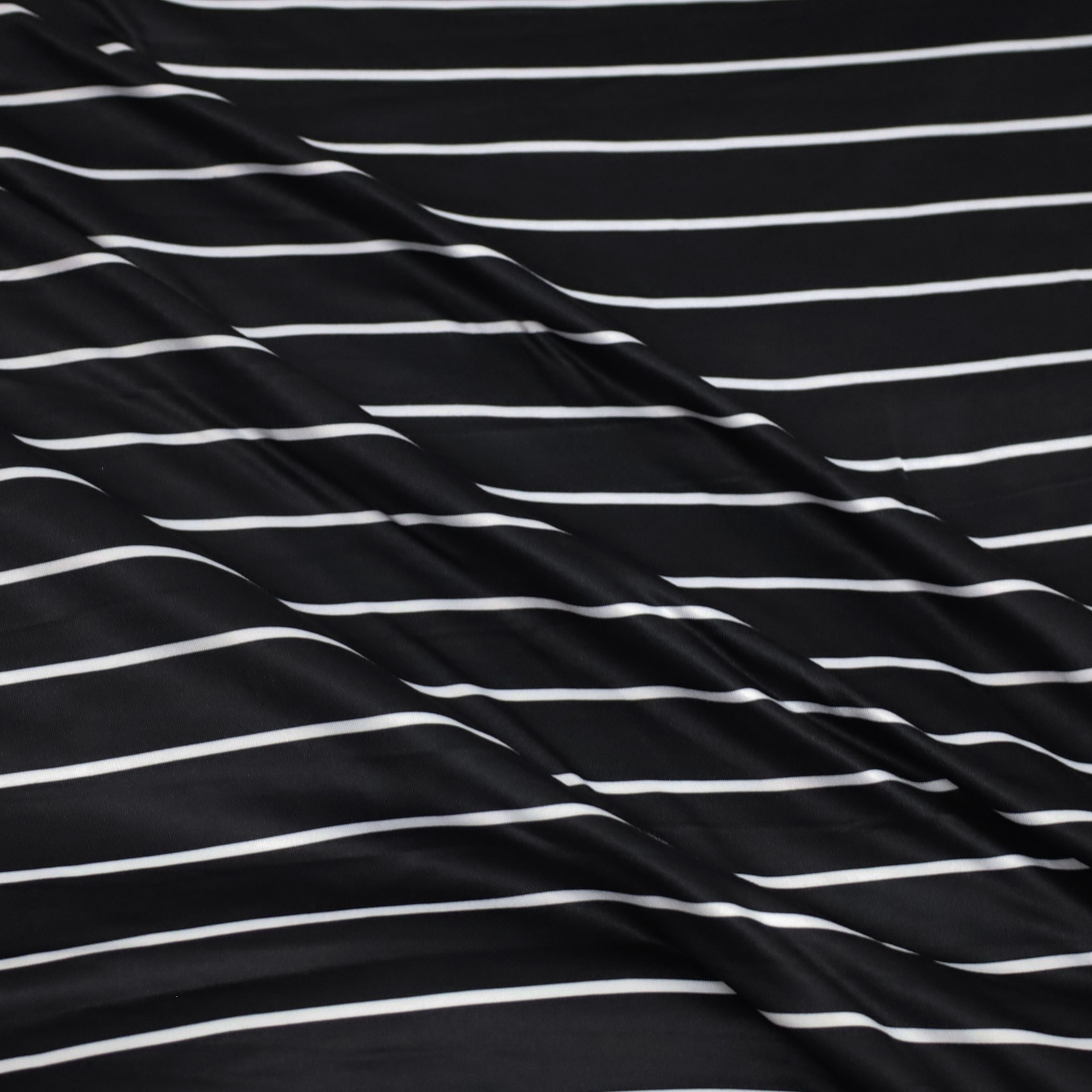 slide 3 of 3, Fabric Merchants White Stripes On Black Double Brushed 4-Way Stretch Fabric, 60 in