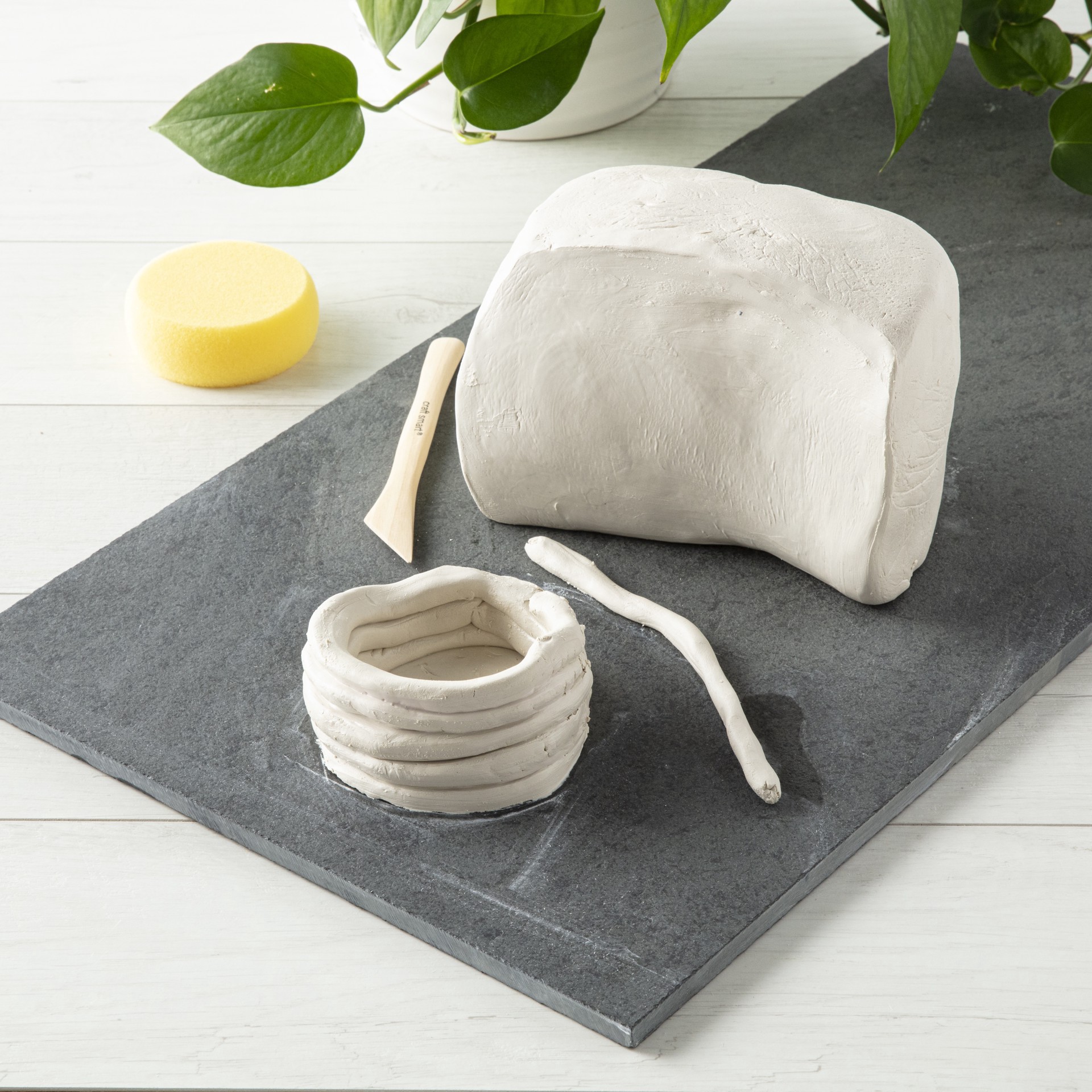 slide 3 of 5, 10lb. Natural Clay By Craft Smart, 10 lb