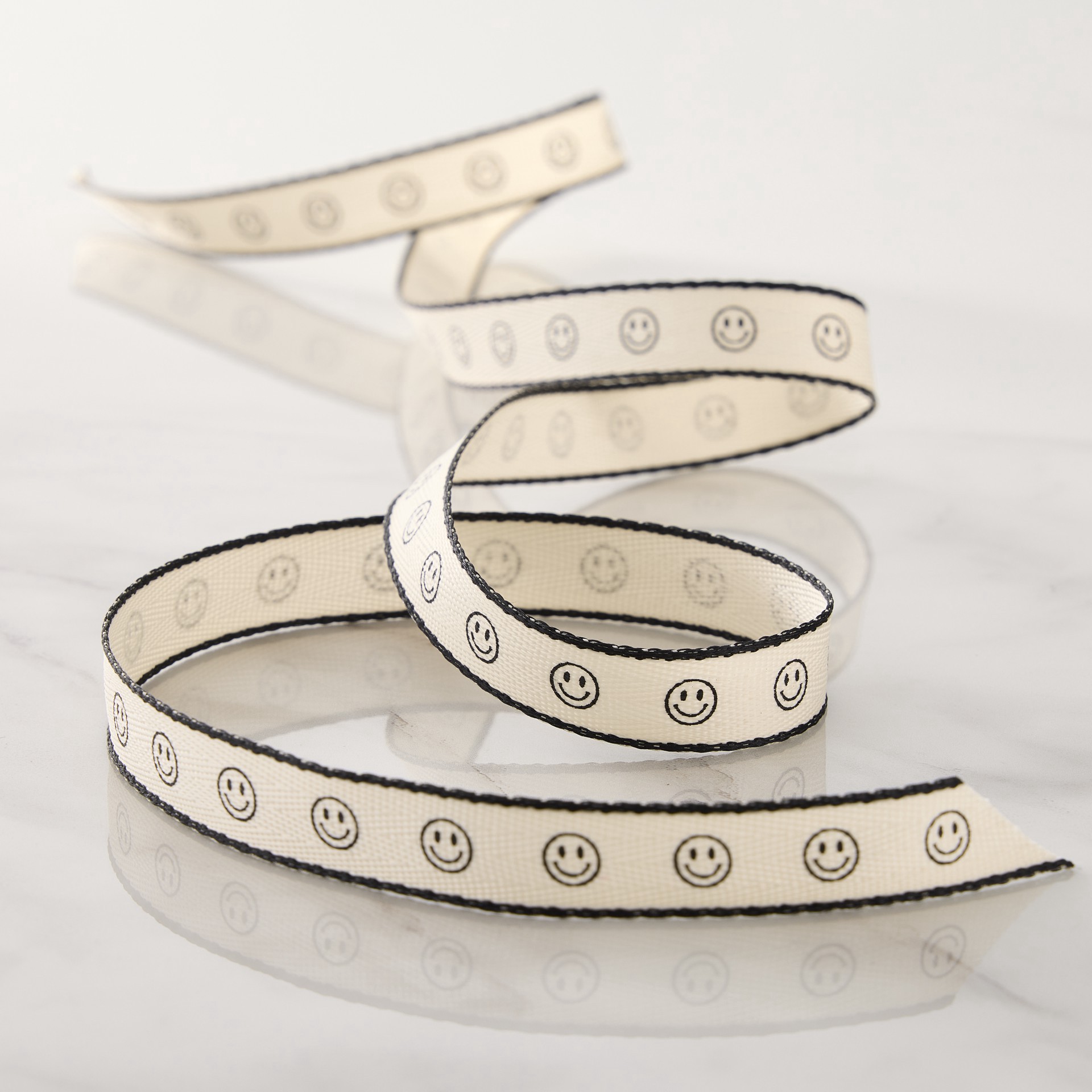 slide 2 of 2, 5/8" X 7yd. Black Smiley Face Faux Linen Ribbon By Celebrate It Classic, 5/8 in x 7 yd