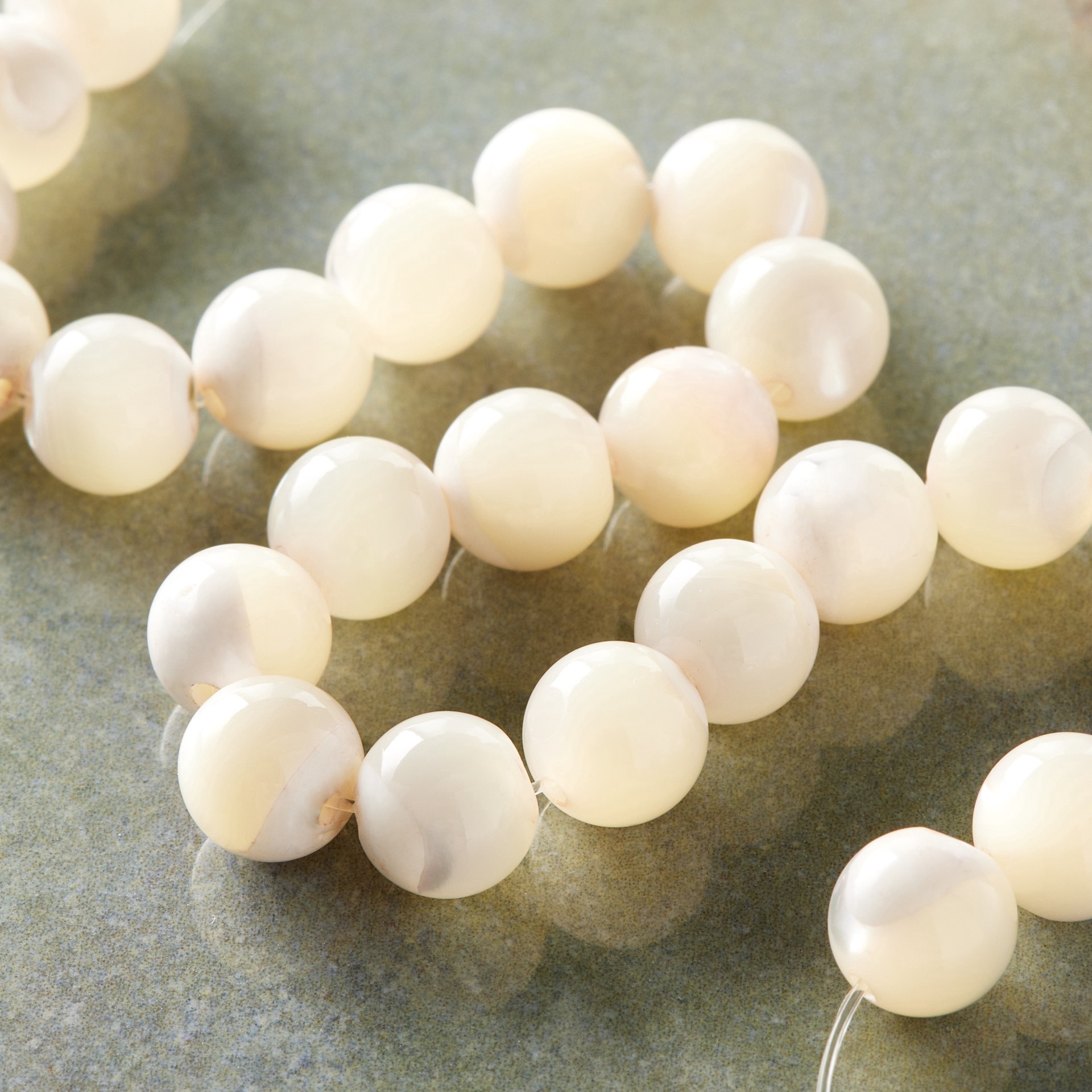 slide 2 of 3, 7mm Light Pink Mother Of Pearl Round Beads By Bead Landing, 7mm