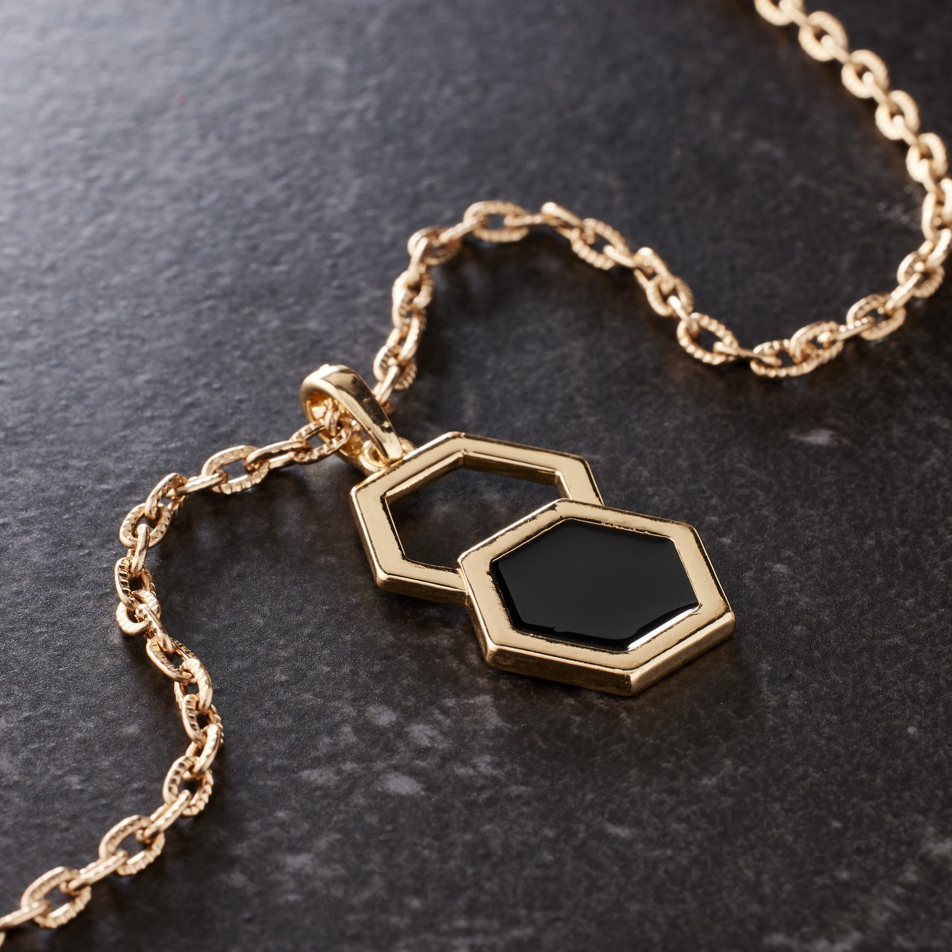 slide 2 of 3, Black & Gold Double Hexagon Pendant By Bead Landing, 20 mm