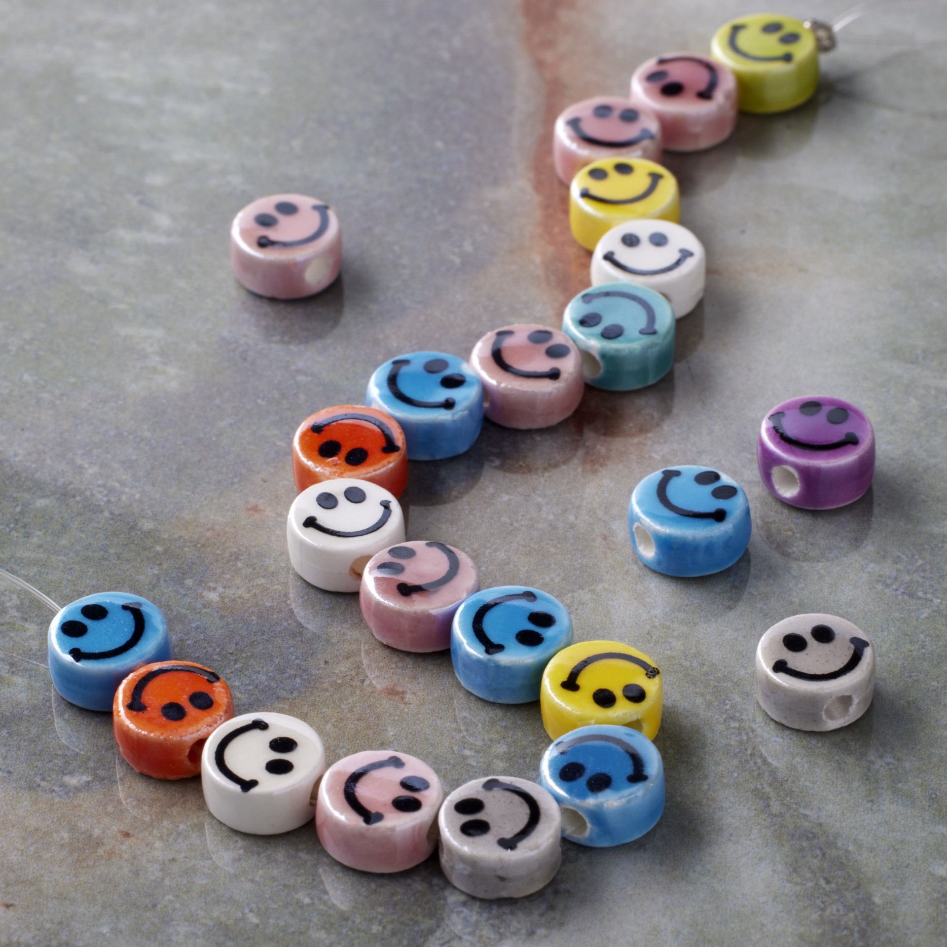 slide 2 of 3, Multicolor Ceramic Smiley Face Beads, 7.5mm By Bead Landing, 7.5mm