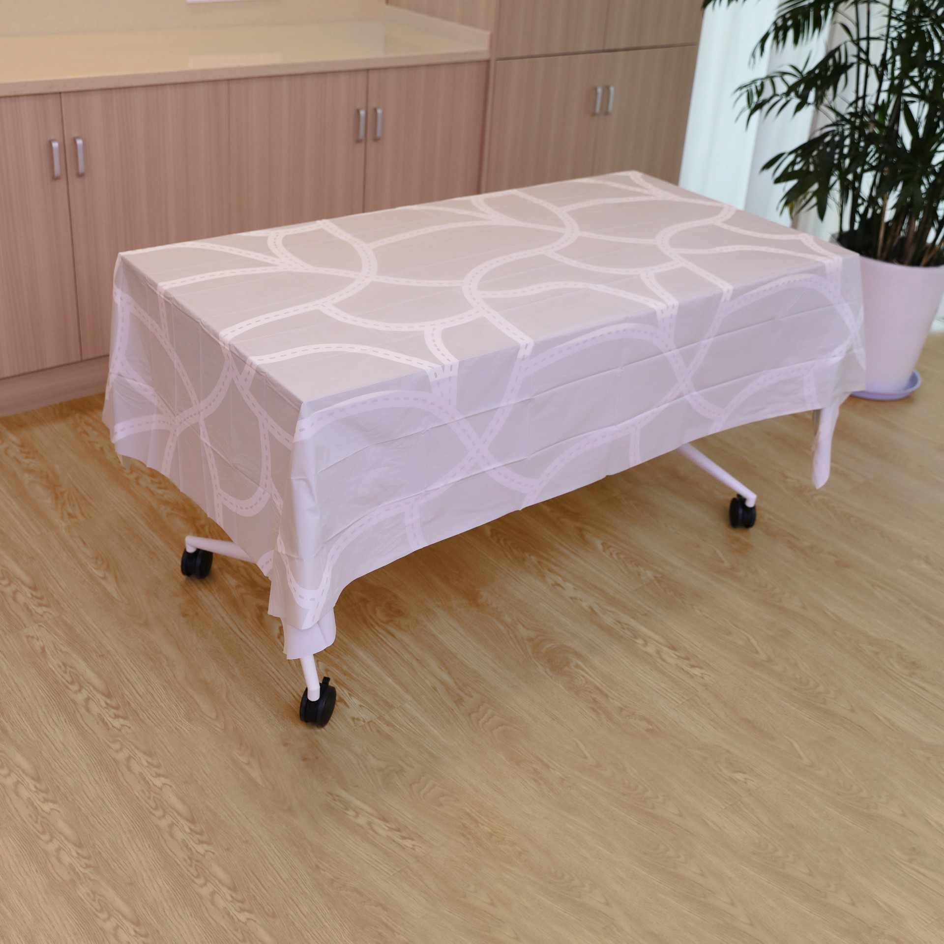 slide 3 of 3, 54" X 108" Road Tracks Plastic Table Cover By Celebrate It, 54 in x 108 in