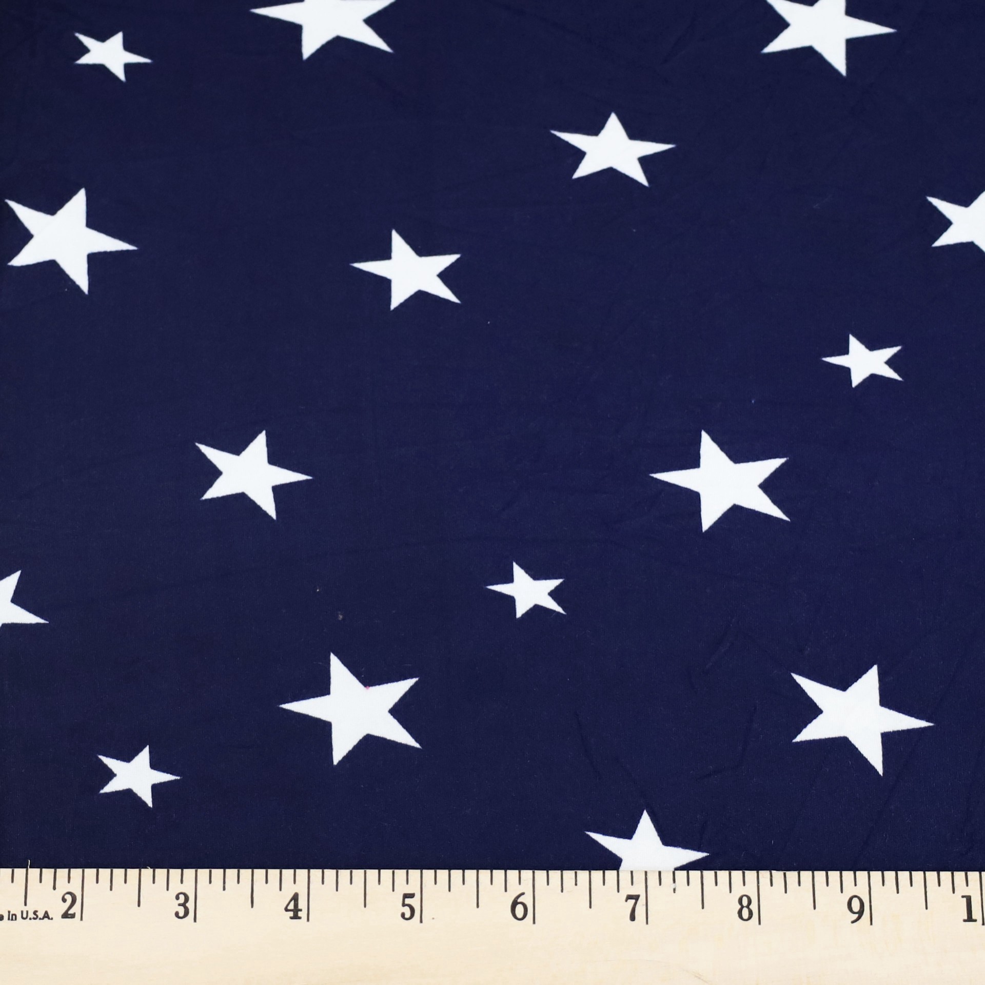 slide 2 of 3, Fabric Merchants Stars On Blue Double Brushed Stretch Fabric, 60 in