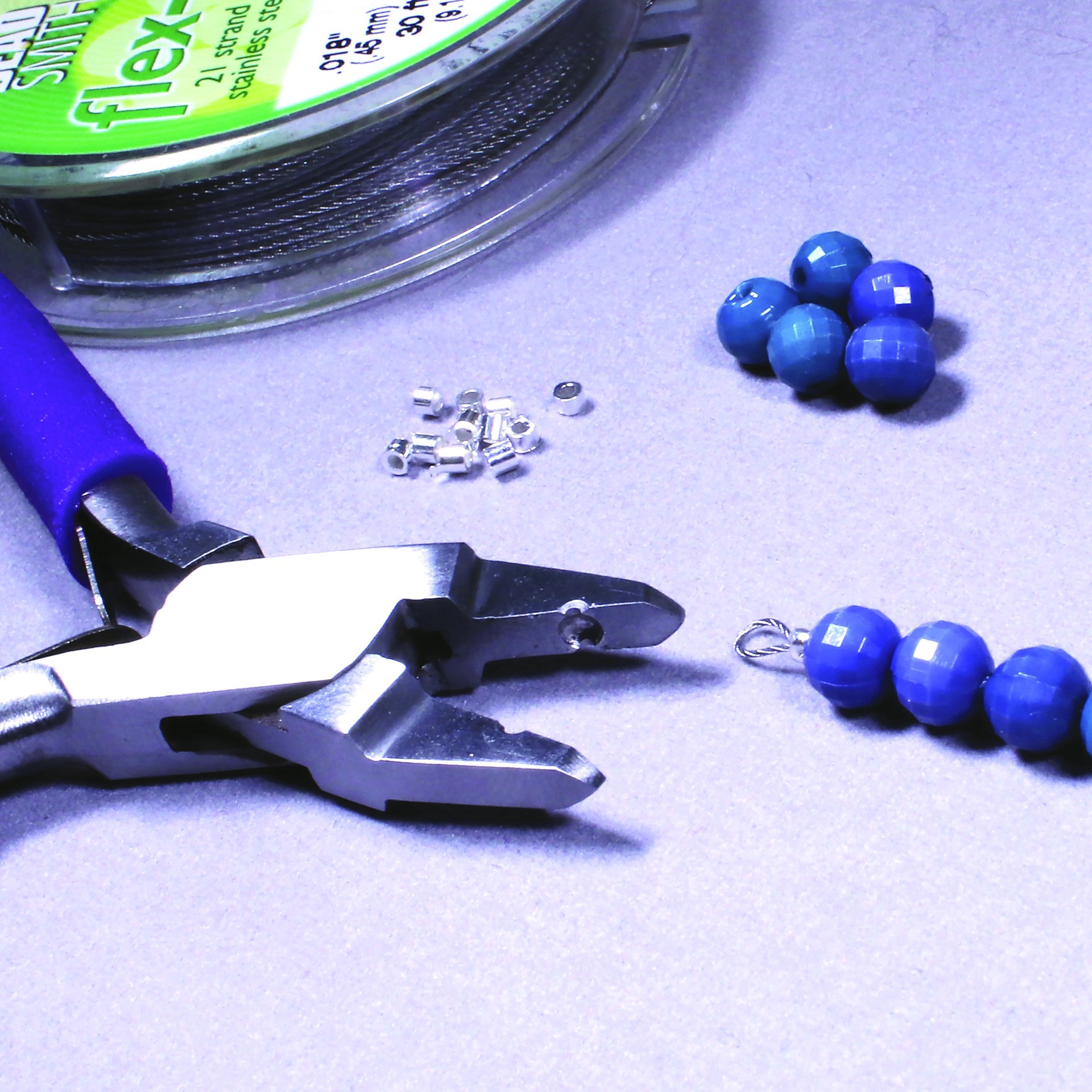 slide 6 of 6, The Beadsmith Magical Crimper Tool, 2mm x 2mm