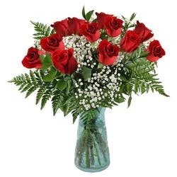 One Dozen Rose Arrangement With Babies Breath & Greens In A Vase