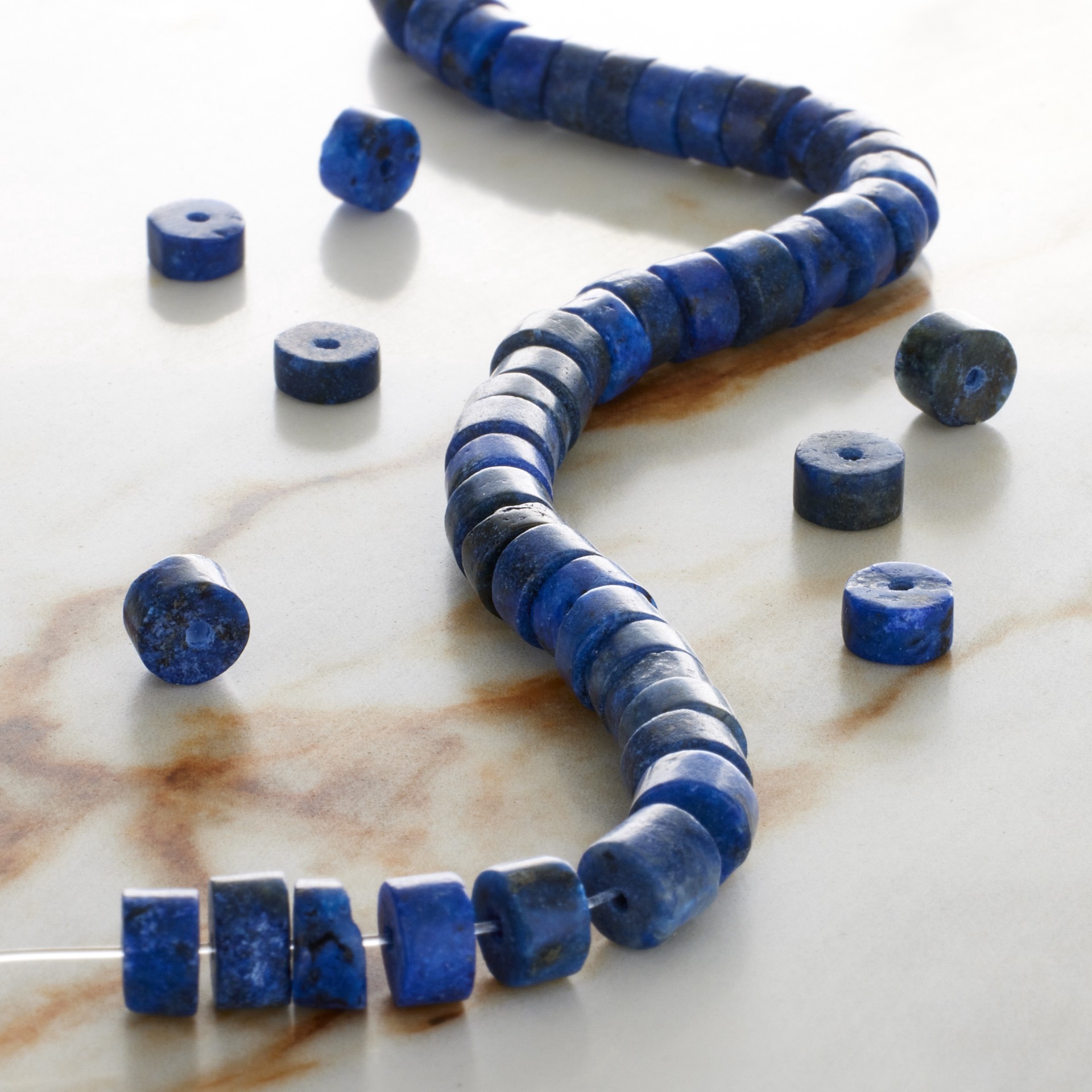 slide 3 of 3, Blue Dyed Lapis Heishi Beads By Bead Landing, 6 mm