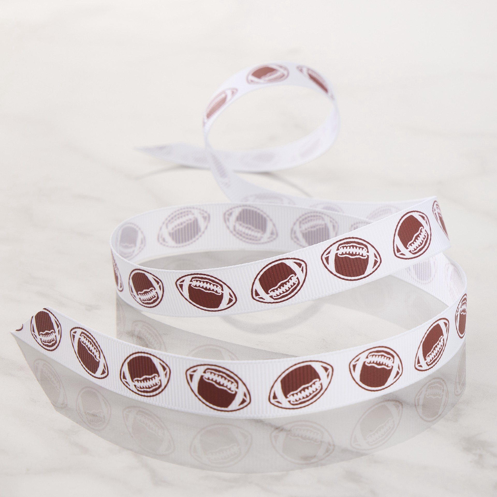 slide 2 of 2, 5/8" X 7yd. Football Ribbon By Celebrate It Classic, 5/8 in x 7 yd