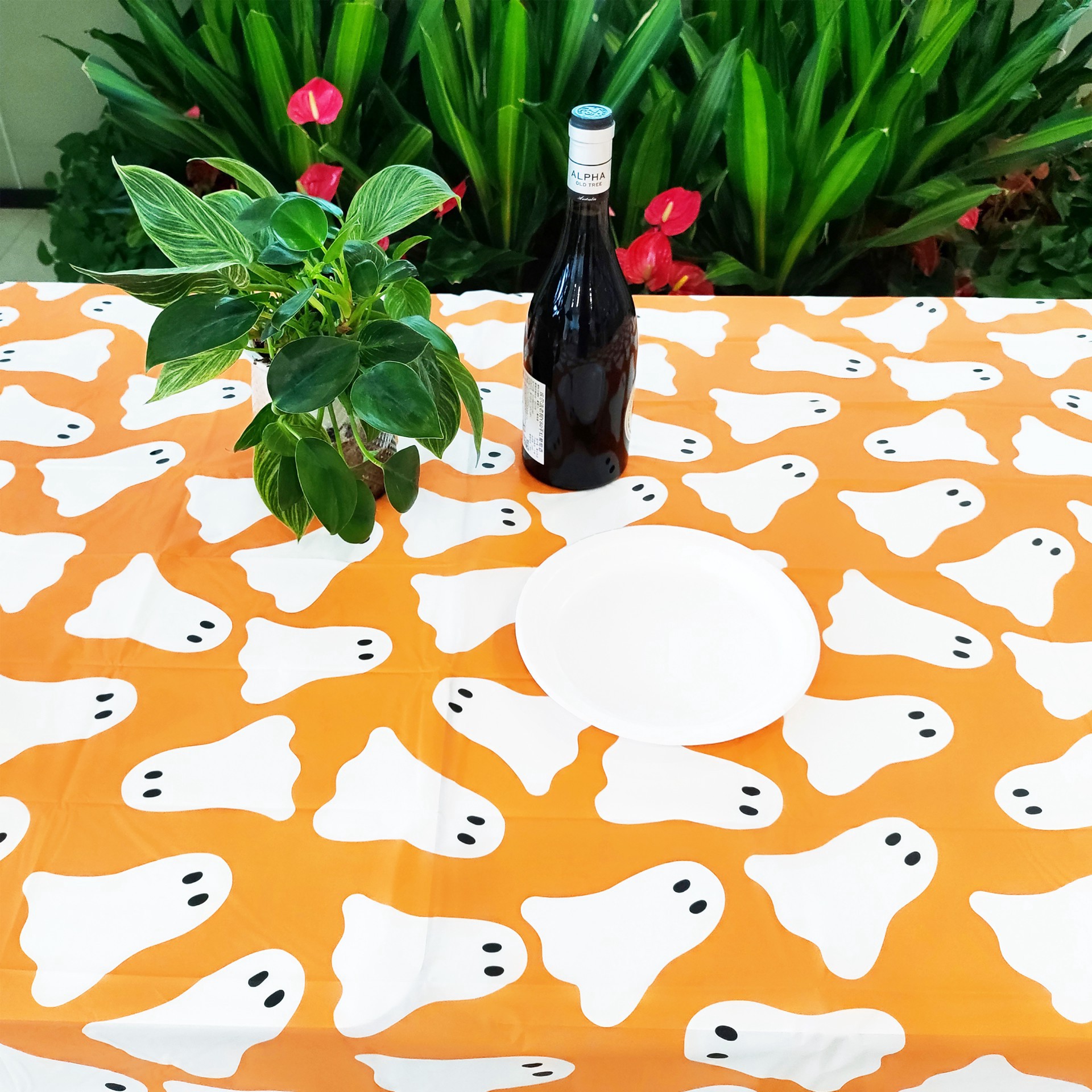 slide 3 of 4, 54" X 108" Orange Ghosts Table Cover By Celebrate It, 54 in x 108 in