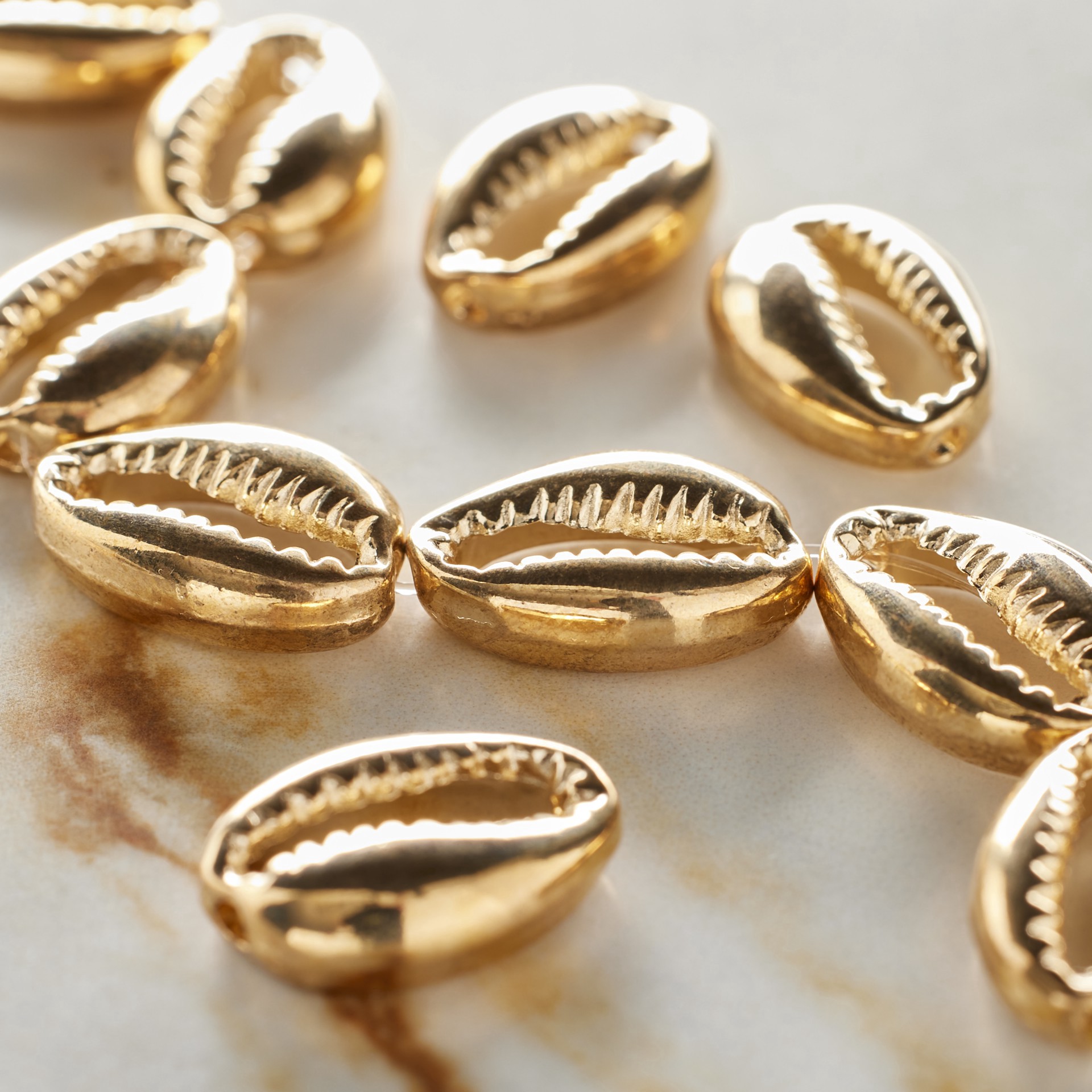 slide 2 of 3, Gold Cowrie Shell Beads By Bead Landing, 17mm, 17mm