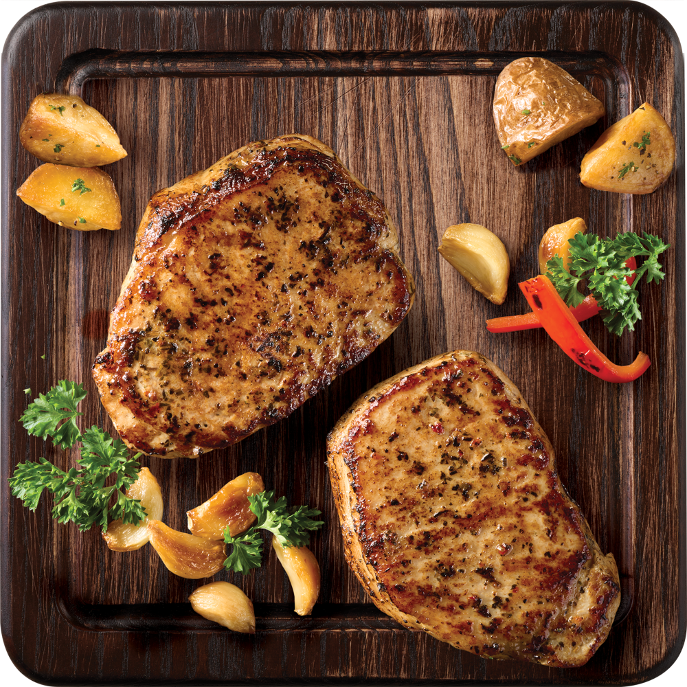 slide 2 of 3, Tyson Pork Chops, Classic Garlic & Herb, 12 oz