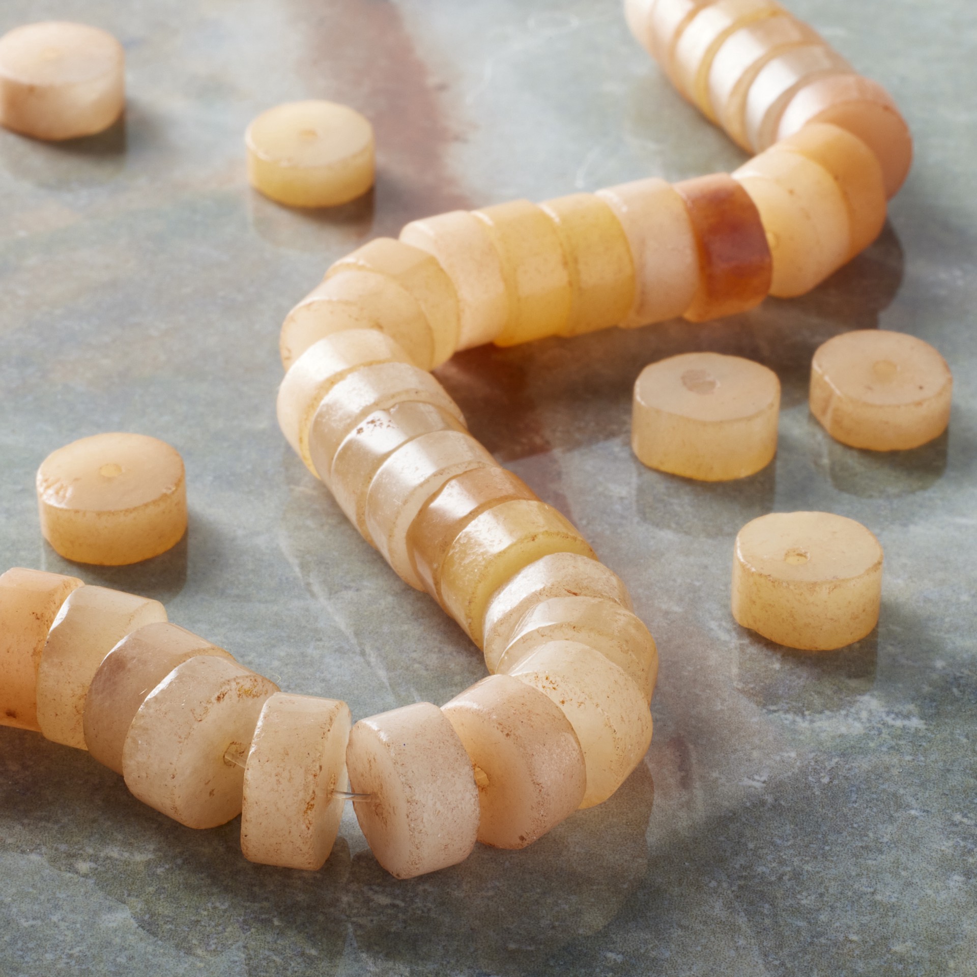 slide 2 of 3, Sunstone Heishi Beads By Bead Landing, 10 mm
