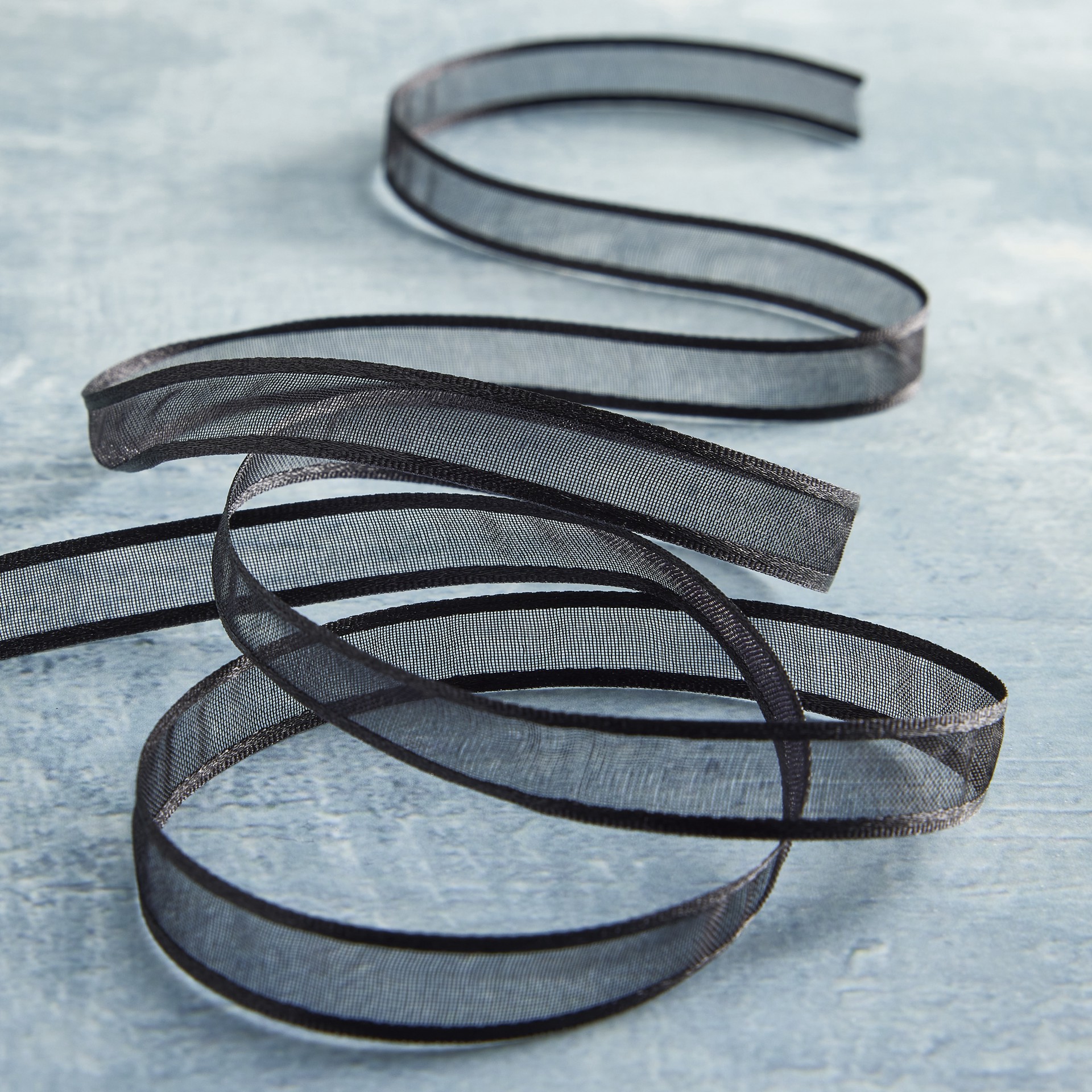 slide 2 of 4, 3/8'' X 7yd. Black Sheer Satin Ribbon By Celebrate It, 3/8 in x 7 yd