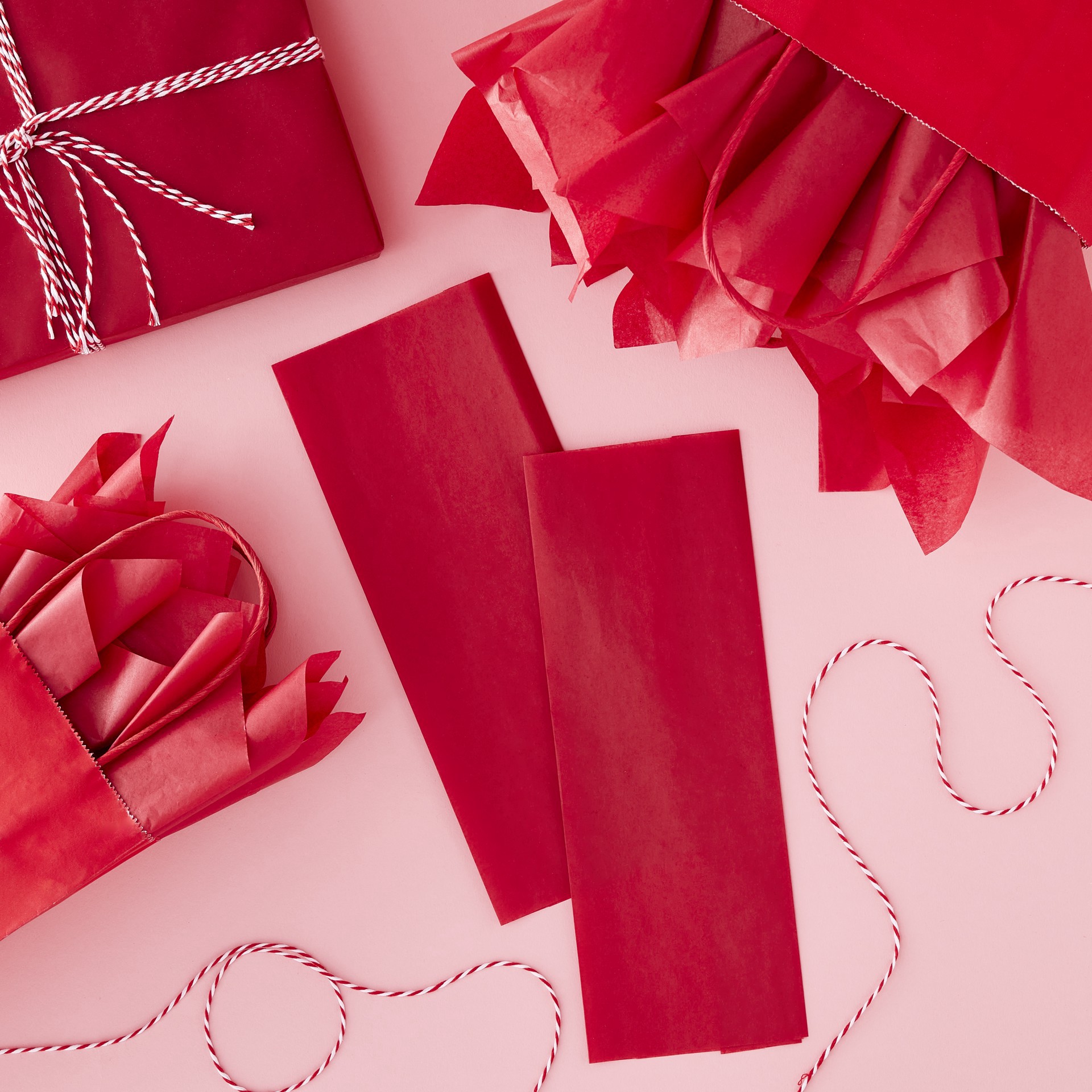 slide 2 of 3, Red Tissue Paper By Celebrate It, 12 Sheets, 20 in x 20 in