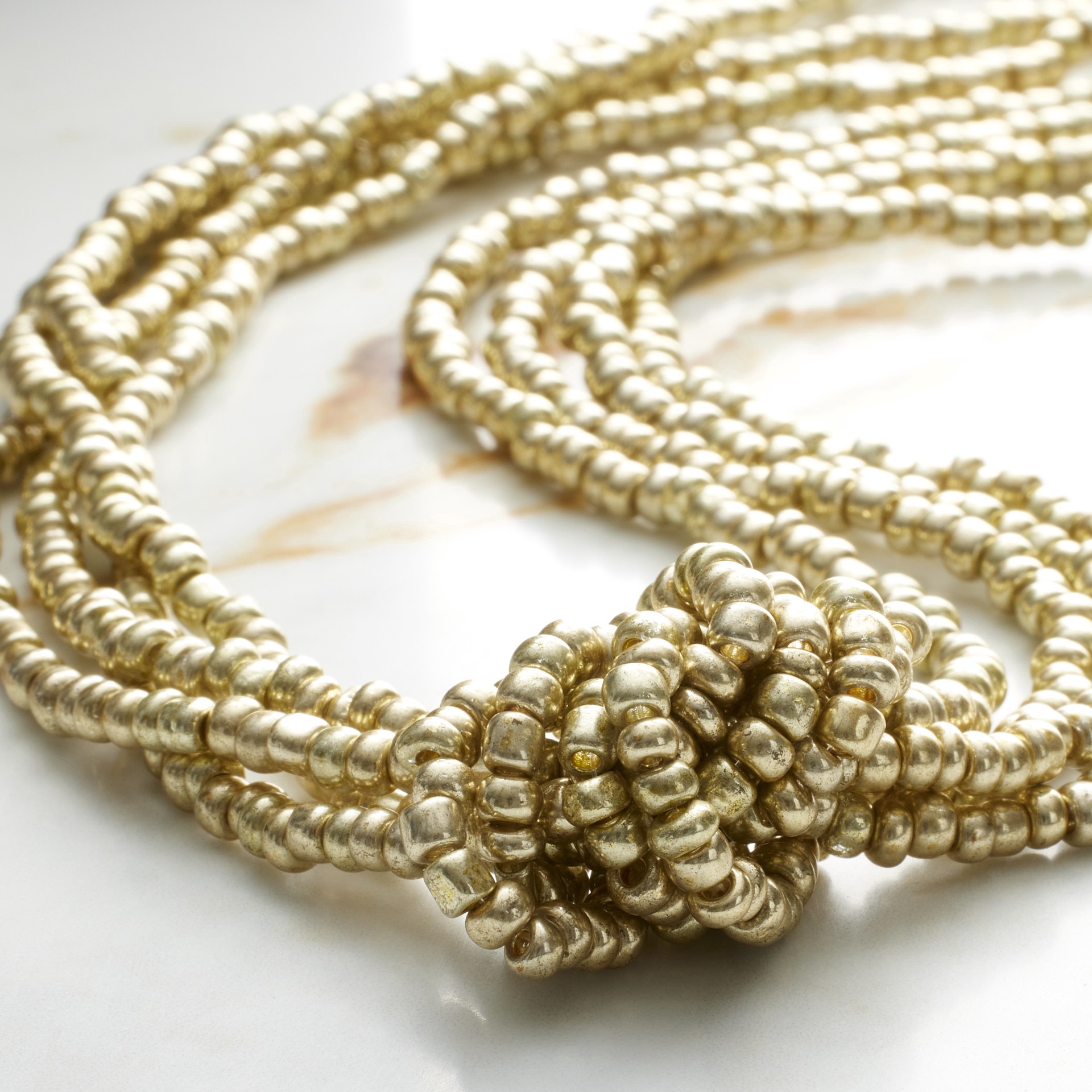 slide 3 of 3, Light Gold Glass Seed Beads, 6/0 By Bead Landing, 6/0