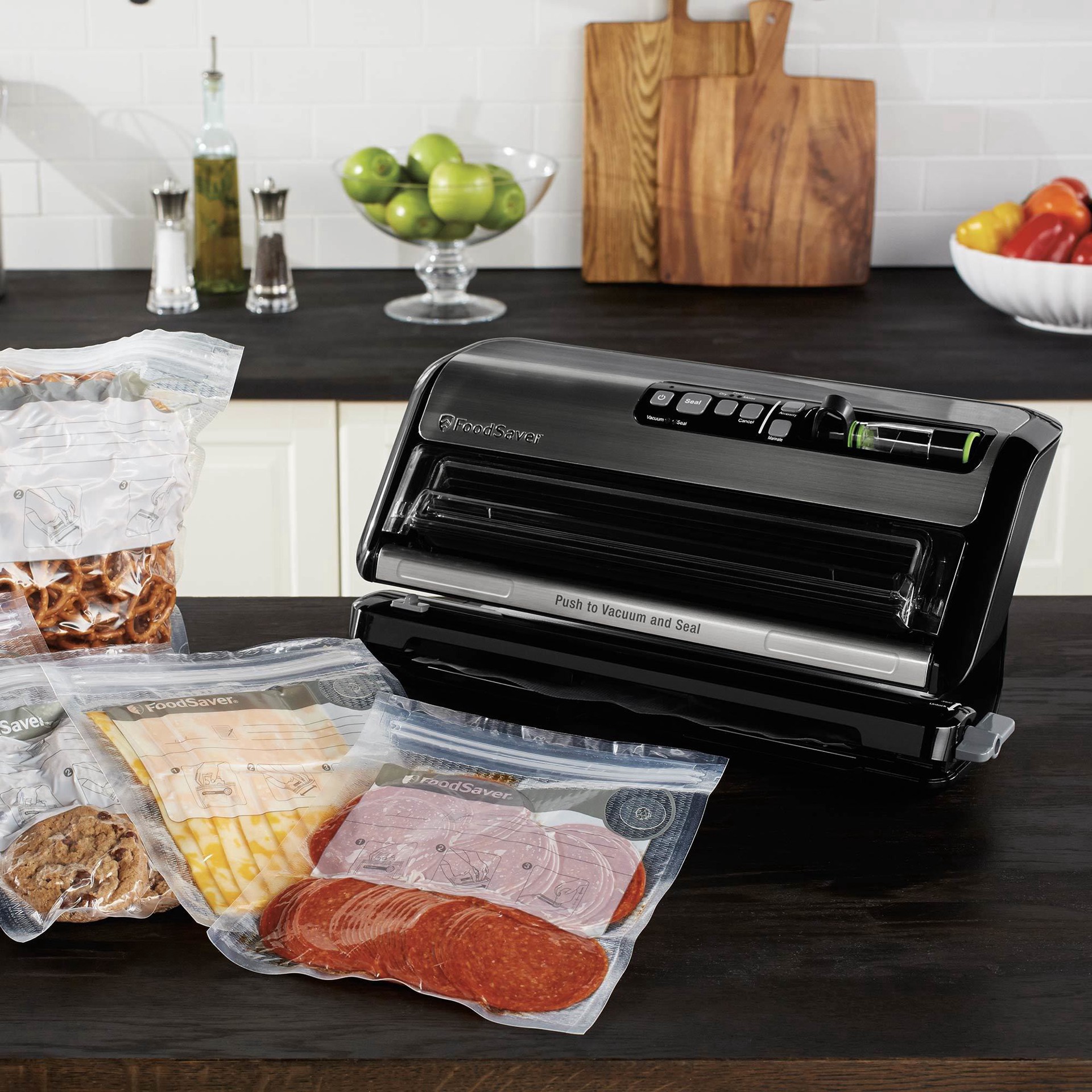 slide 14 of 15, FoodSaver Vacuum Sealer with Express Bag Maker, Built-In Handheld Sealer, and Bags and Roll Starter Kit - Black - FM5200, 1 ct