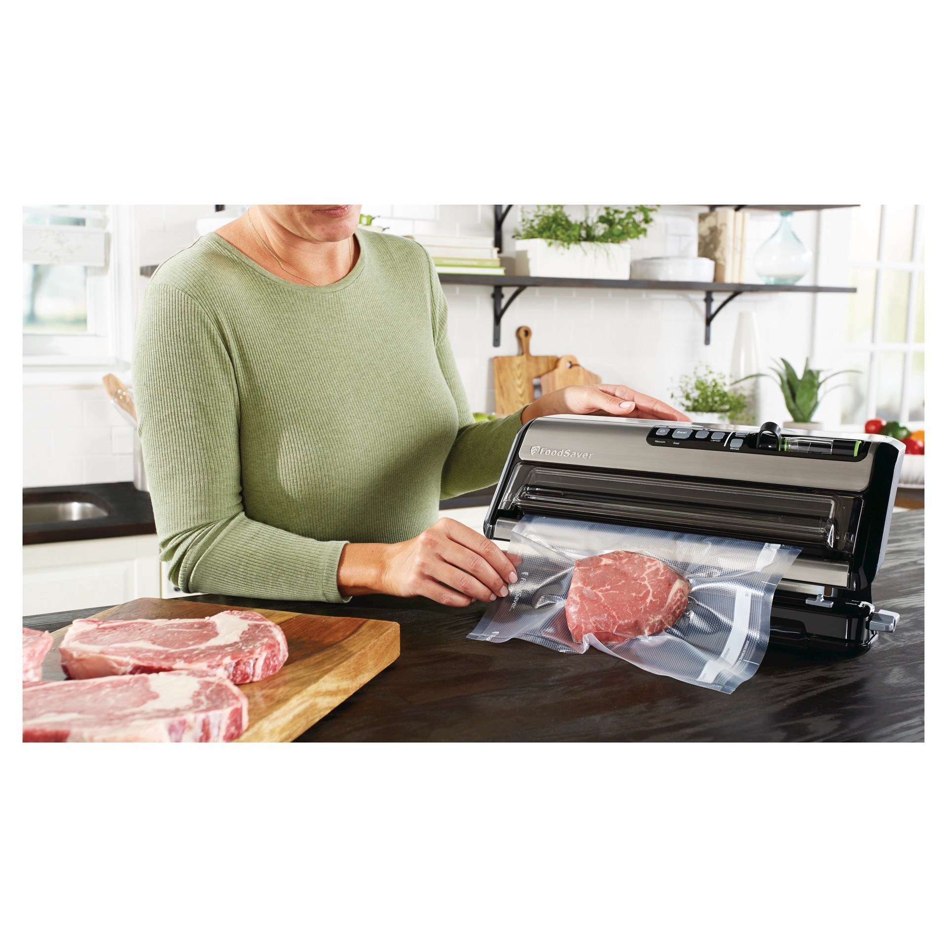 slide 12 of 15, FoodSaver Vacuum Sealer with Express Bag Maker, Built-In Handheld Sealer, and Bags and Roll Starter Kit - Black - FM5200, 1 ct