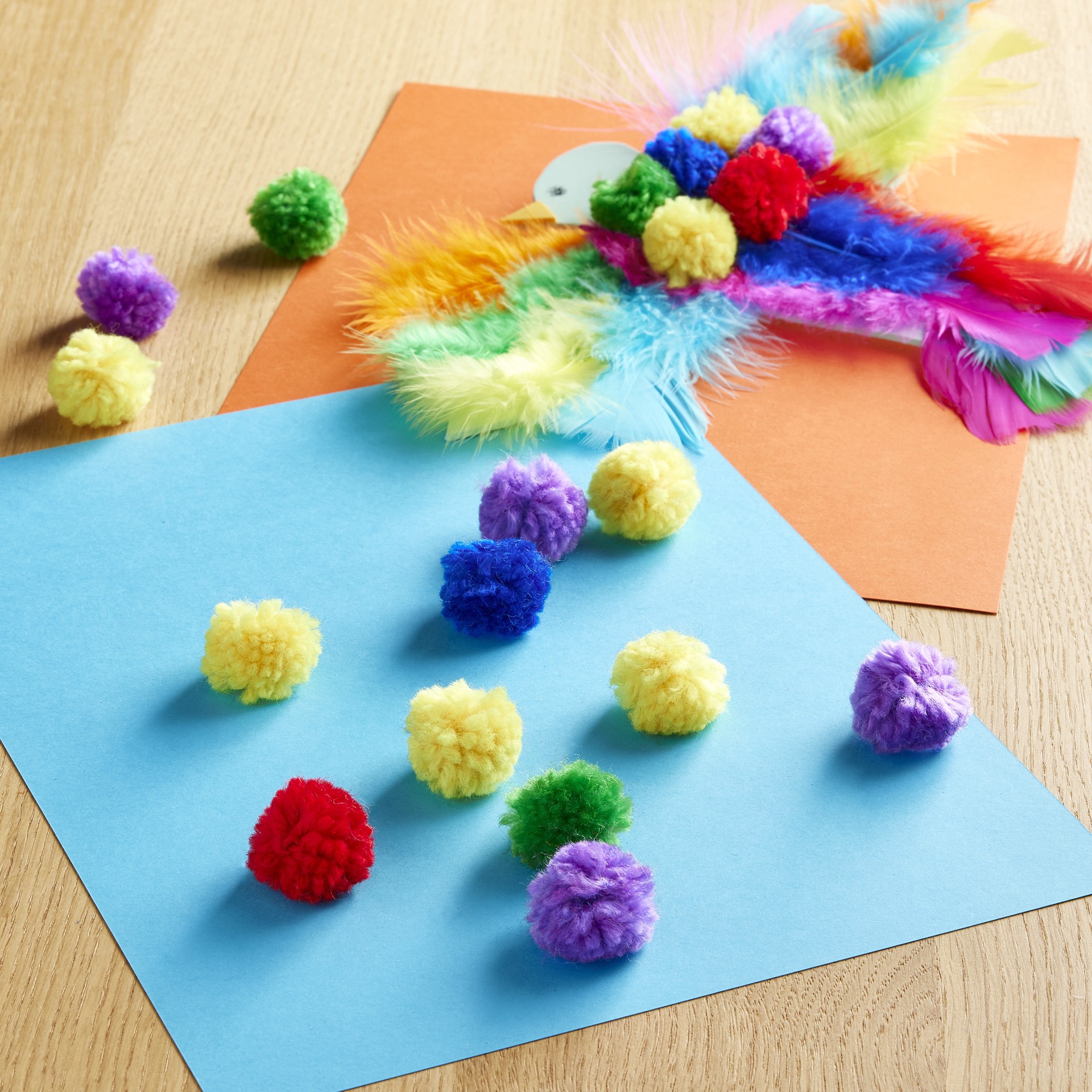 slide 3 of 3, Rainbow Yarn Pom Poms By Creatology, 1 in