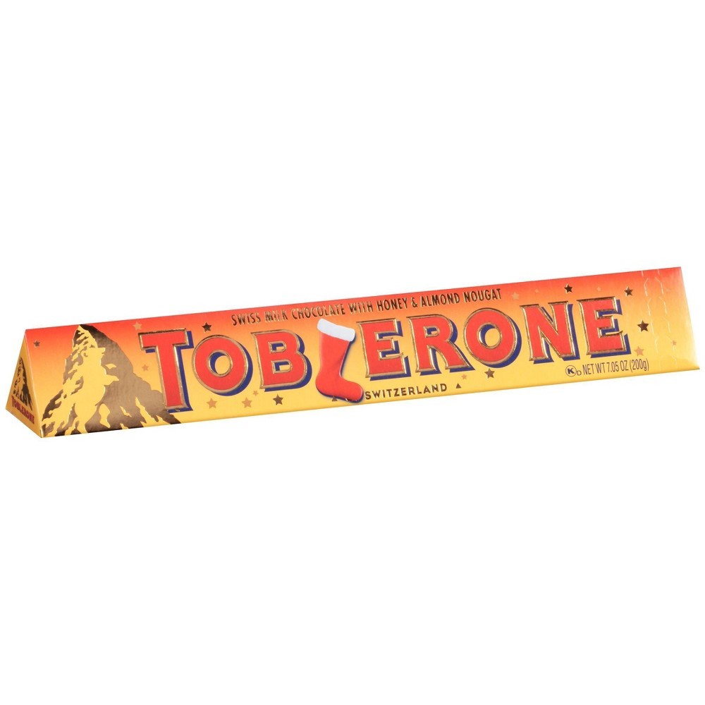 slide 9 of 10, TOBLERONE Swiss Milk Chocolate with Honey & Almond Nougat, Holiday Chocolate, 7.05 oz Bar, 0.01 lb