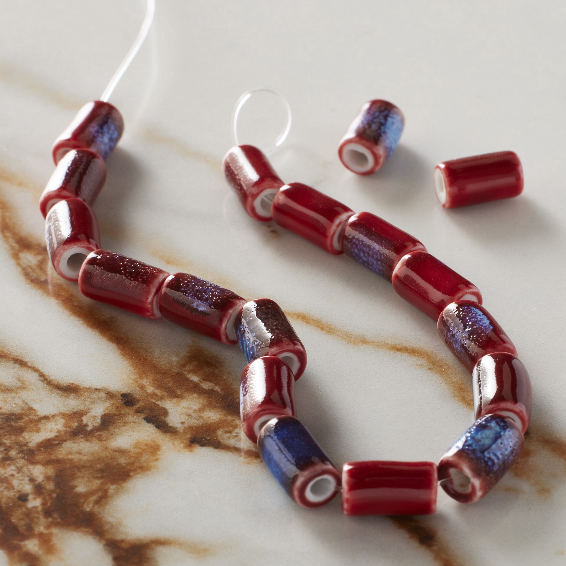 slide 3 of 3, Red Tube Ceramic Beads, 9.8mm By Bead Landing, 9.8mm