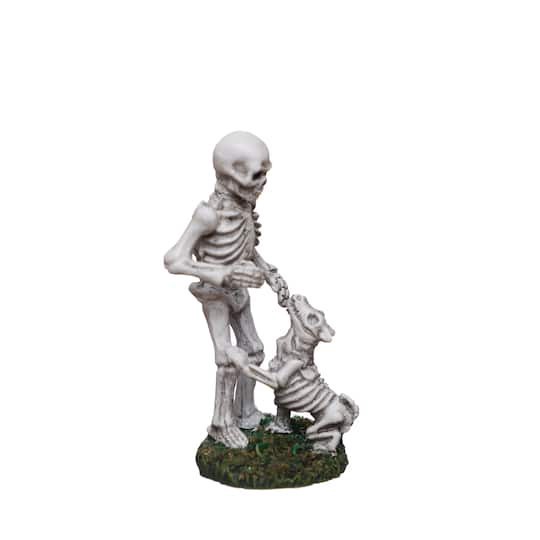 slide 1 of 3, Mini Skeleton With Dog Decoration By Ashland, 1.375 in x 1.5 in x 3 in